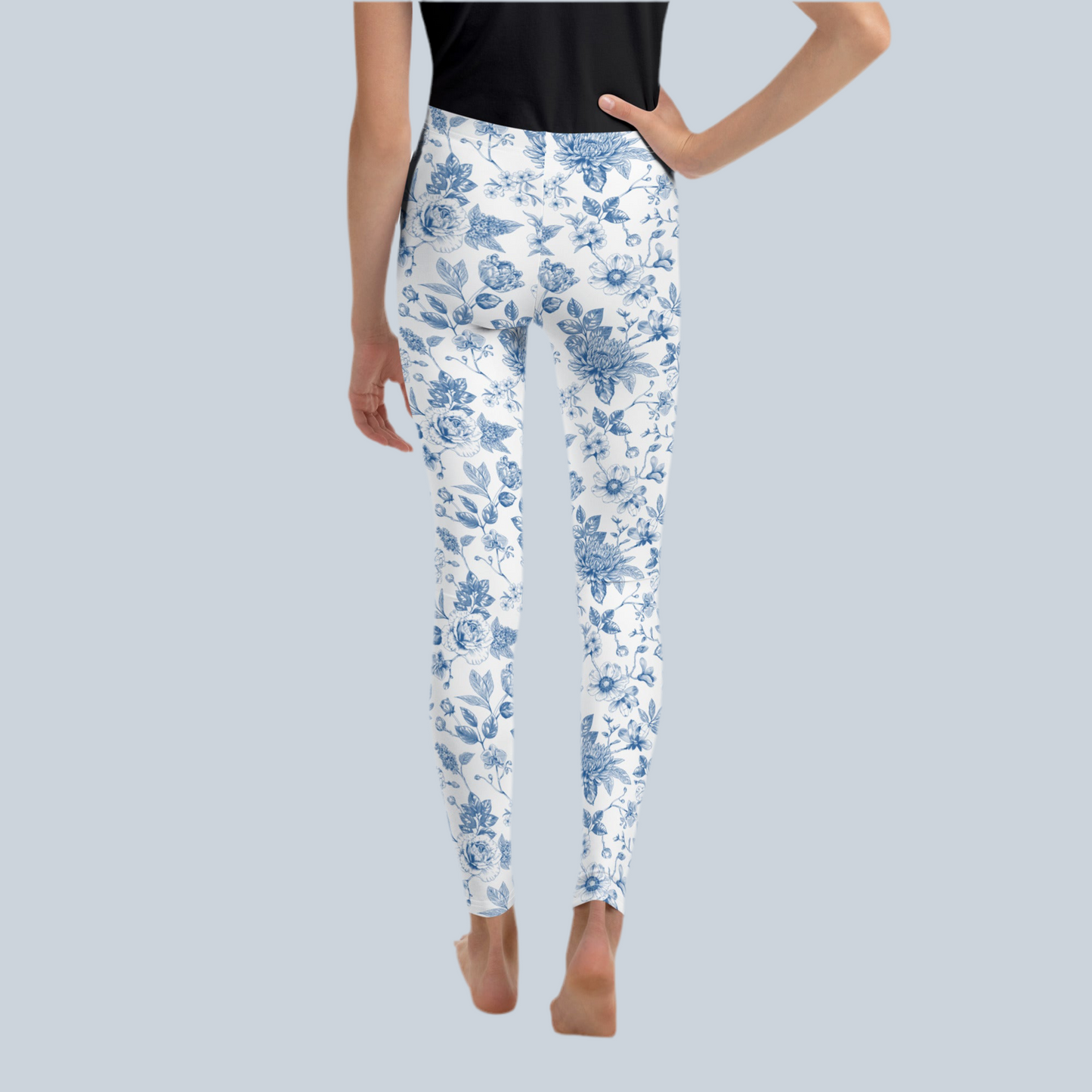 Image: Blue Toile Girls Leggings in youth sizes bring classic charm to modern kids fashion. Featuring an elegant floral toile design, these soft leggings are perfect for tweens and teens who love comfy yet chic clothing. Wear them to school, brunch, or as part of a family matching set. Makes a sweet birthday or holiday gift for stylish young girls who love pretty prints, by jaecrece.