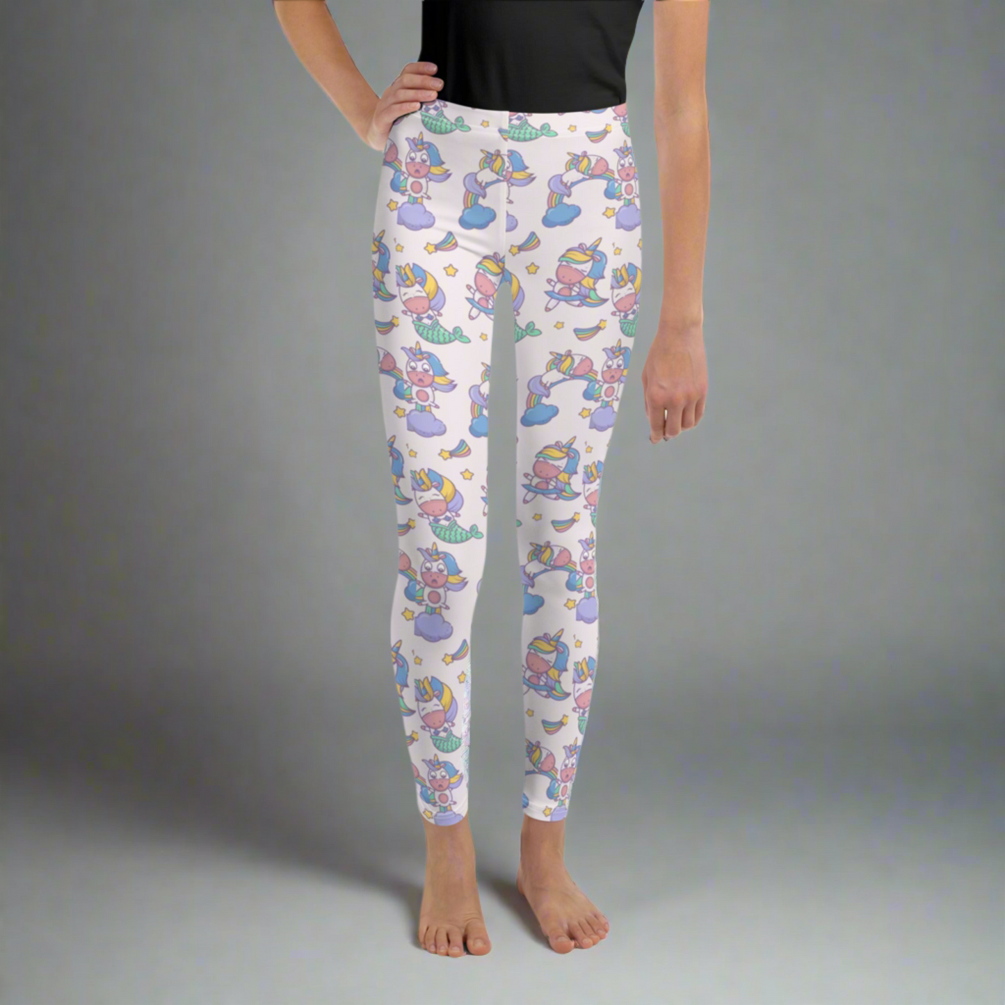 Image: Unicorn Mermaid Kawaii Girls Leggings. These pastel pink yoga pants feature a cute pattern graphic of Unicorn mermaids, stars and rainbows. The perfect birthday present, Christmas gift, school outfit for toddlers, tweens and teens, by jaecrece
