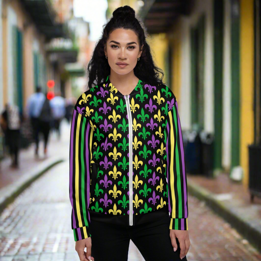 Celebrate Carnival in style with this unisex Mardi Gras bomber jacket featuring a fleur de lis pattern in gold, green, and purple across the front and back. The long sleeves include coordinating stripes for a festive flair. Perfect for NOLA parades, French Quarter outfits, or stylish layering during Mardi Gras celebrations in New Orleans. Sizes XS–3XL. Pairs well with family matching leggings.