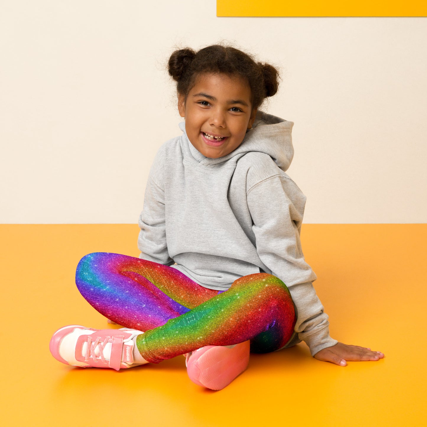 Colorful and comfy rainbow swirl leggings for toddlers and little girls in sizes 2T–7. Featuring a faux glitter holographic pattern, these stretchy pants are perfect for Pride Month, Mardi Gras, parades, 5Ks, and family matching. Designed with bold color, soft fabric, and an elastic waistband for active little ones who love to move and shine. Ideal for festivals, playdates, or photo shoots.