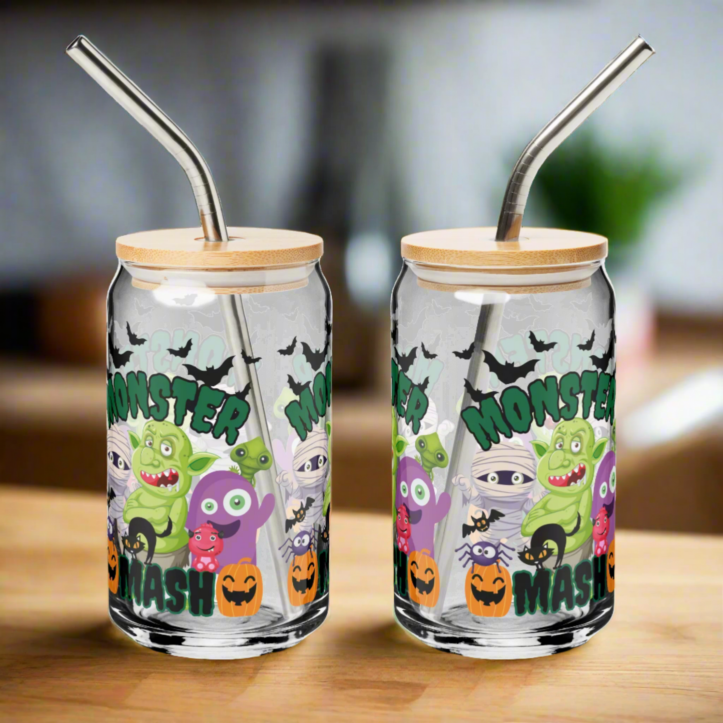 Monster Mash Halloween glass can, 16 oz size with bamboo lid and reusable straw, featuring adorable monster designs, bats, and pumpkins. Perfect fall drinkware for iced coffee, cocktails, mocktails, or sparkling water. Reusable eco-friendly tumbler that’s great for Halloween parties, seasonal entertaining, or as a thoughtful gift. Fun spooky season glass cup, festive autumn beverage can, cute monster party drinkware.