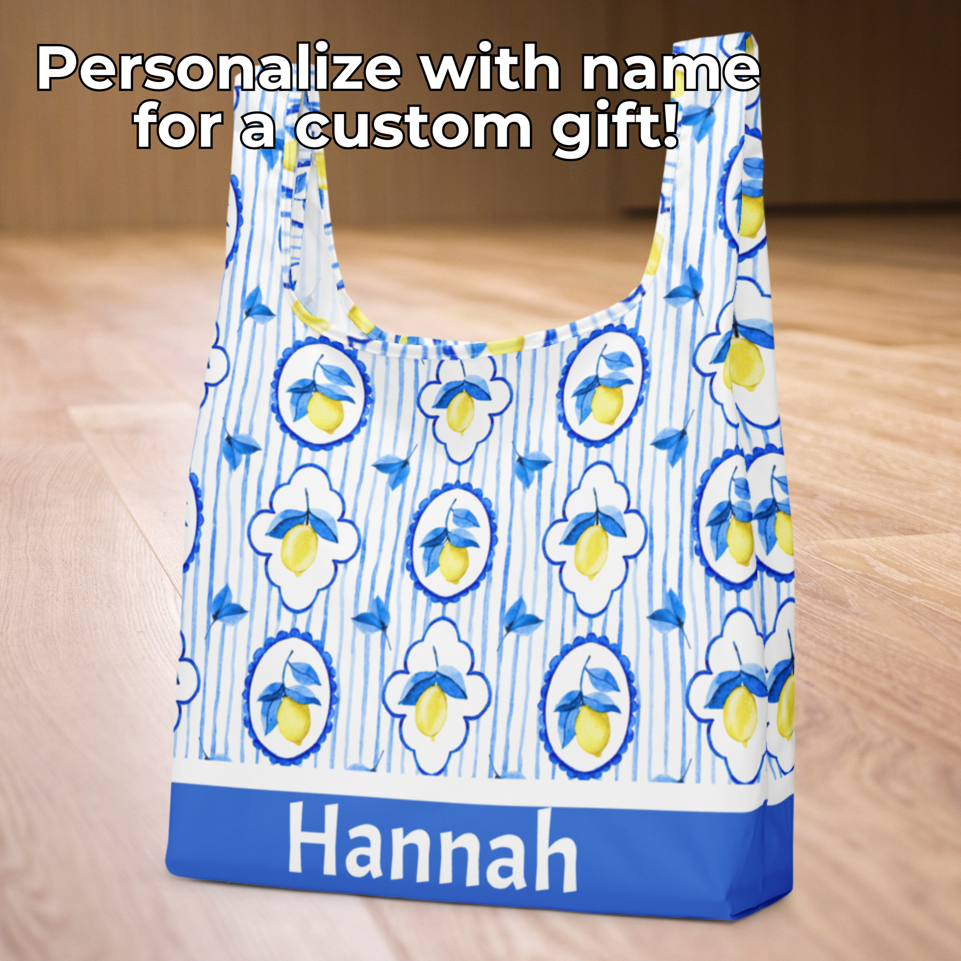 Amalfi Lemon Tote Bag brings Mediterranean charm to everyday errands with its vibrant lemon and tile print. Eco friendly and reusable, this washable tote is made with strong straps integrated into the design so they won’t snap, even with heavy use. Measuring 15.5" × 25.3", it folds neatly with an elastic band, making it ideal for groceries, farmers markets, and travel. A thoughtful gift for her, teachers, and moms.