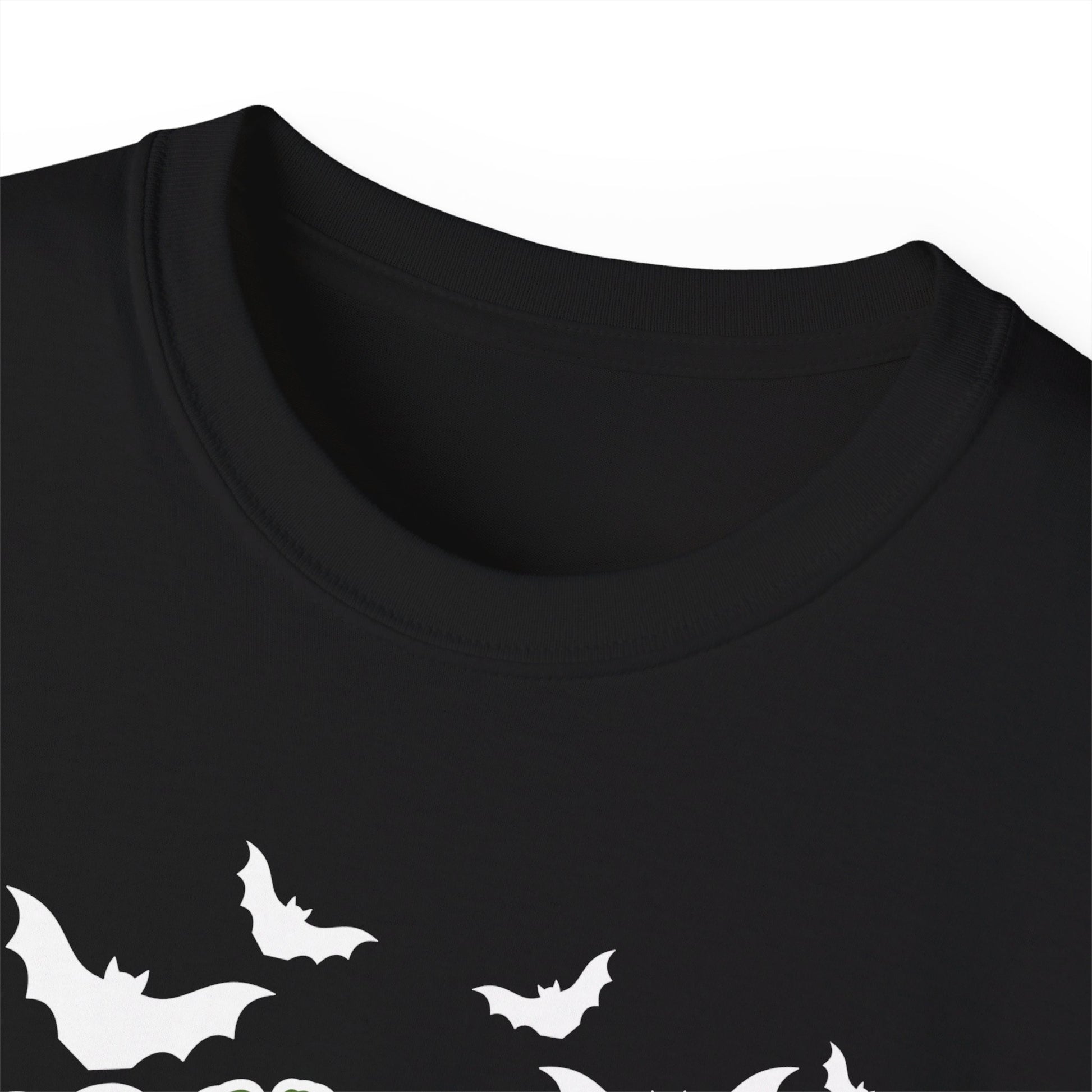 Black Monster Mash graphic t-shirt for adults with spooky cartoon designs featuring a mummy, pumpkins, bats, troll, and spider, making it the perfect Halloween party shirt. Made with durable, breathable cotton on the Gildan 2000, this unisex Halloween tee is available in sizes S–5XL. Ideal for haunted houses, trick-or-treating, fall festivals, or casual spooky outfits, this fun t-shirt is a must-have Halloween gift idea for him or her.