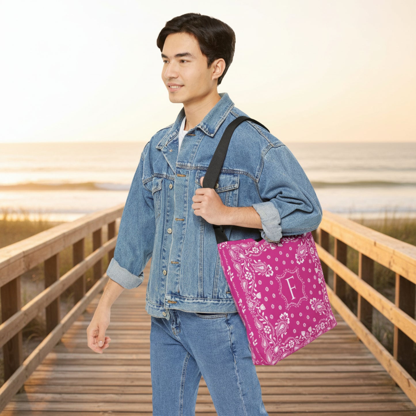 Personalized hot pink tote bag with a timeless bandana paisley print and adjustable crossbody strap. Designed with a black lined interior and convenient inside pocket, this custom tote is ideal for teachers, students, commuters, and busy moms.