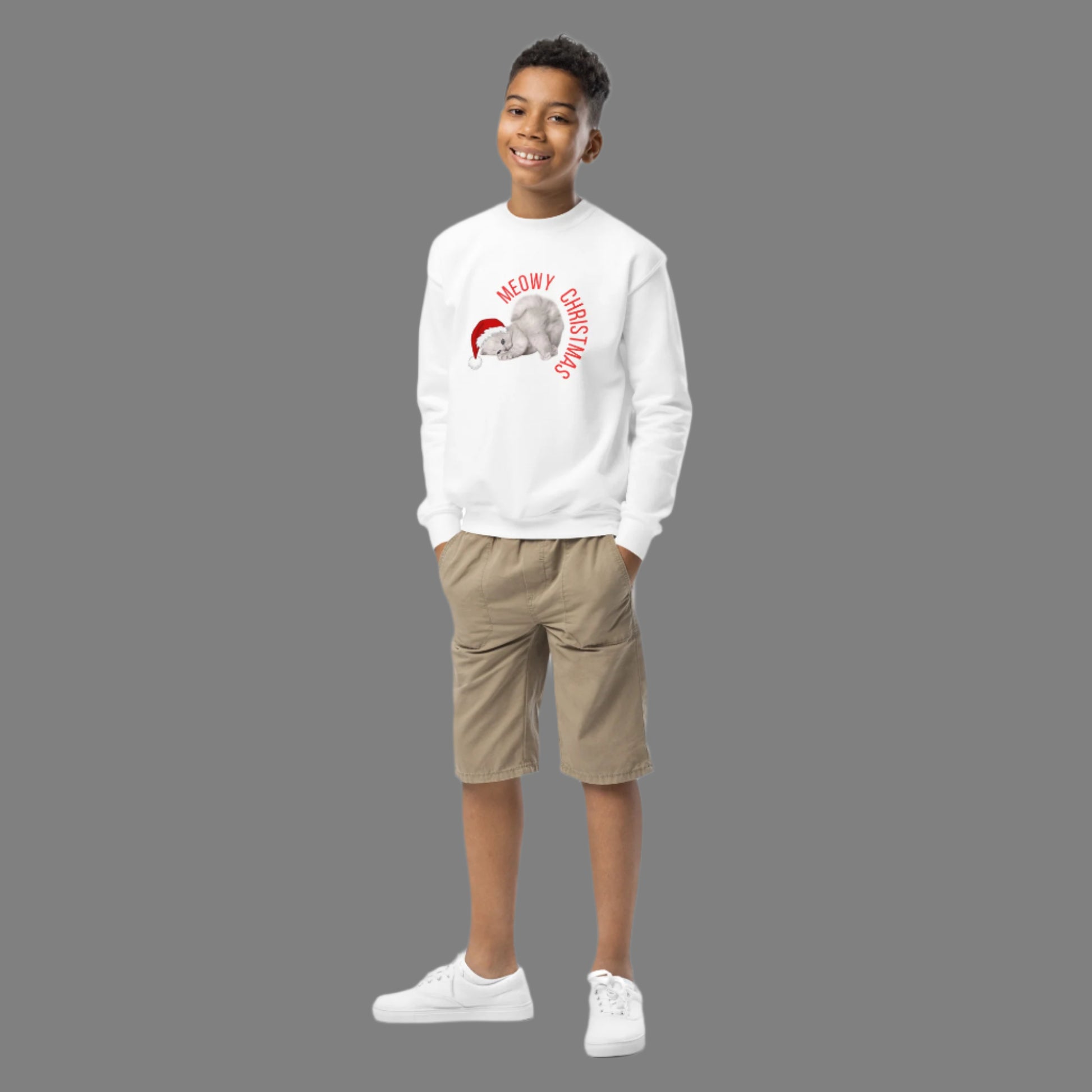 Our Youth Meowy Christmas Sweatshirt (XS–XL) brings a playful twist to holiday style. Featuring a festive kitty in a Christmas setting, it’s ideal for kids who love cats and enjoy spreading seasonal cheer. Great for school, playdates, or family gatherings, this unisex sweatshirt is both cozy and cute. A wonderful Christmas gift for young cat lovers, it combines comfort and humor for a merry wardrobe upgrade.