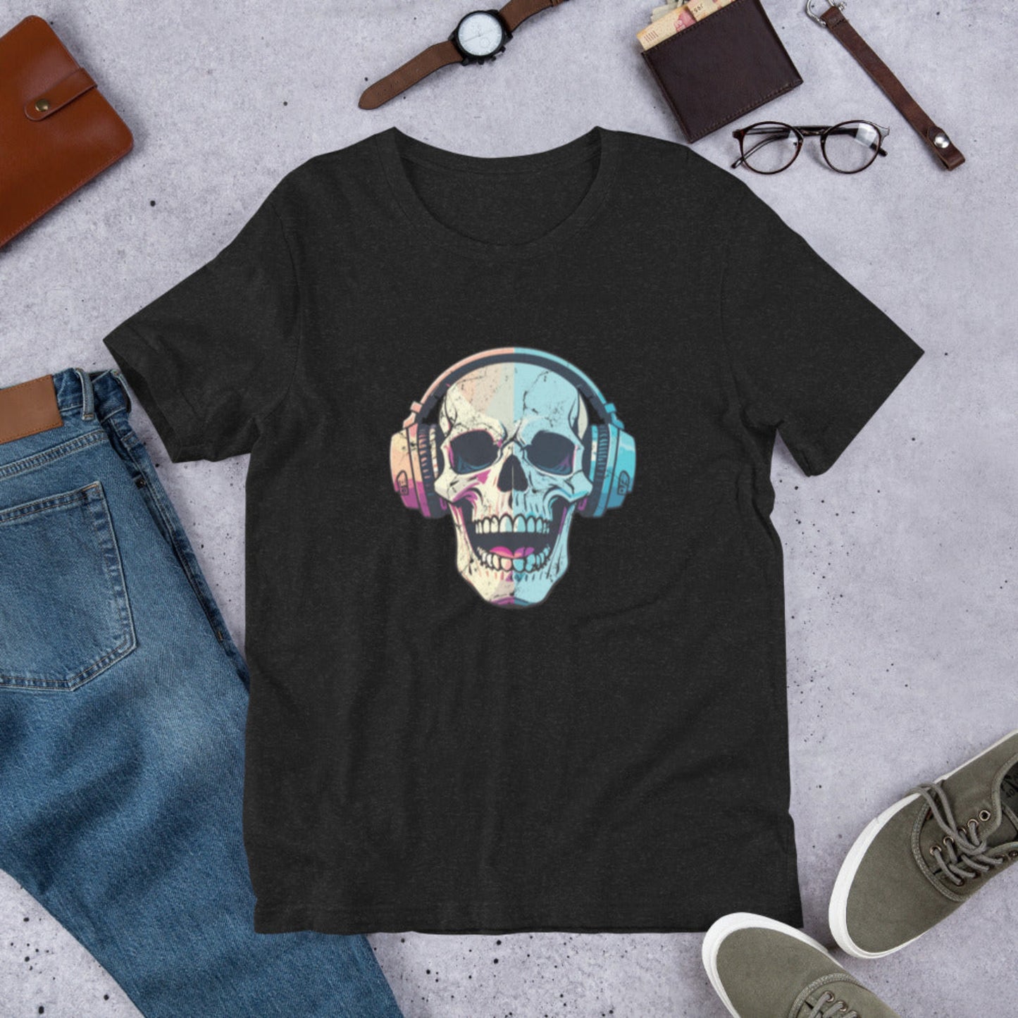 Halloween-ready black t-shirt featuring a grinning skull with headphones, capturing the eerie energy of haunted playlists and October nights. This unisex tee is ideal for alt music lovers, goth fashion fans, and those who love spooky but wearable designs. Made from breathable cotton and available in inclusive sizing from XS–5XL for all haunted wardrobes.