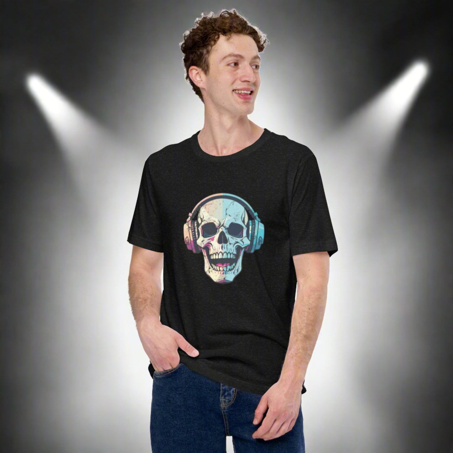 Close-up of black unisex t-shirt with a high-contrast graphic of a laughing skull in headphones. This spooky Halloween shirt is perfect for alt-style fans, music lovers, and anyone drawn to creepy-cool streetwear. Whether worn for October events or year-round haunted vibes, it’s available in XS–5XL to fit a wide range of body types and spooky styles.
