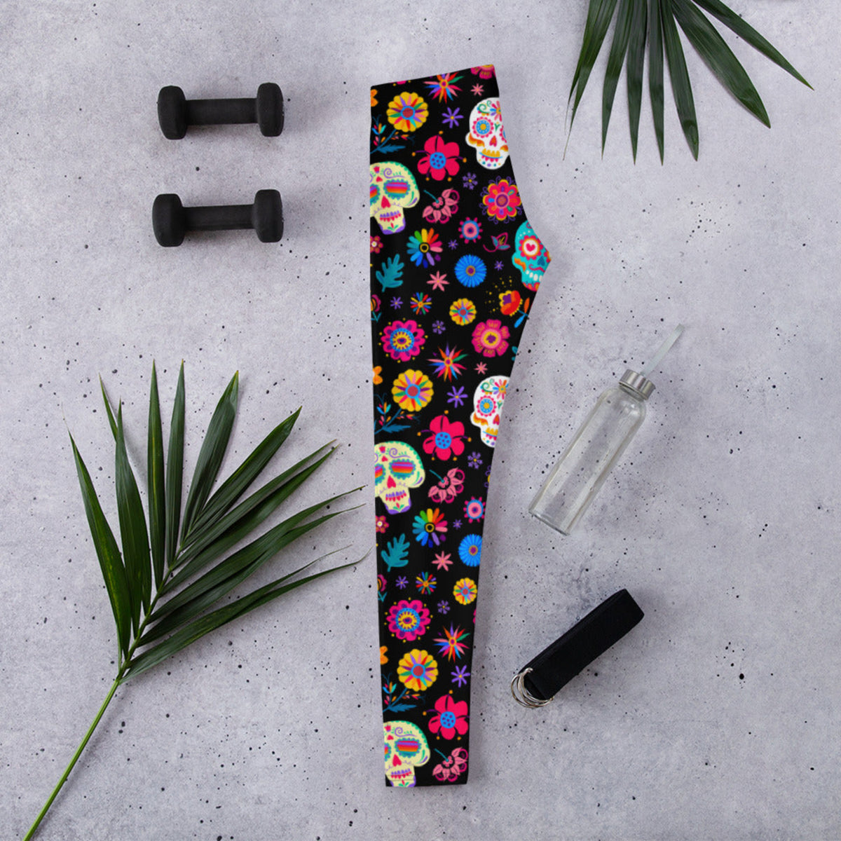 Vibrant and festive, these Día de los Muertos leggings for women feature sugar skull artwork and floral accents that celebrate Mexican culture. Available in sizes XS–XL with a comfortable mid-rise waistband, they’re ideal for Halloween, fall parties, and themed classroom looks. Made from a soft, stretchy blend that moves with you. Coordinates with toddler and youth leggings for matching family outfits.