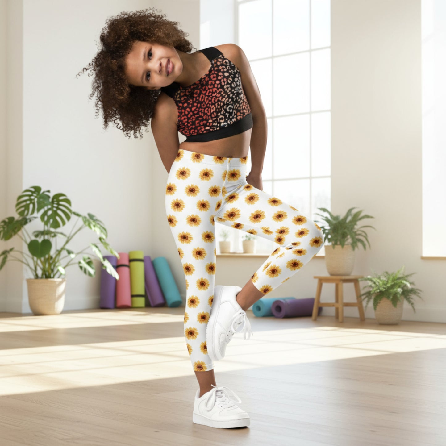 Soft and cheerful, these sunflower leggings for girls 2T–7 are perfect for active days and cozy moments. The bright sunflower print pops against a crisp white background, creating a playful and happy look. Made from stretchy, durable microfiber, they keep their shape and color wash after wash. Ideal for play, preschool, or family outings, and available in matching sizes for mom and big sister.