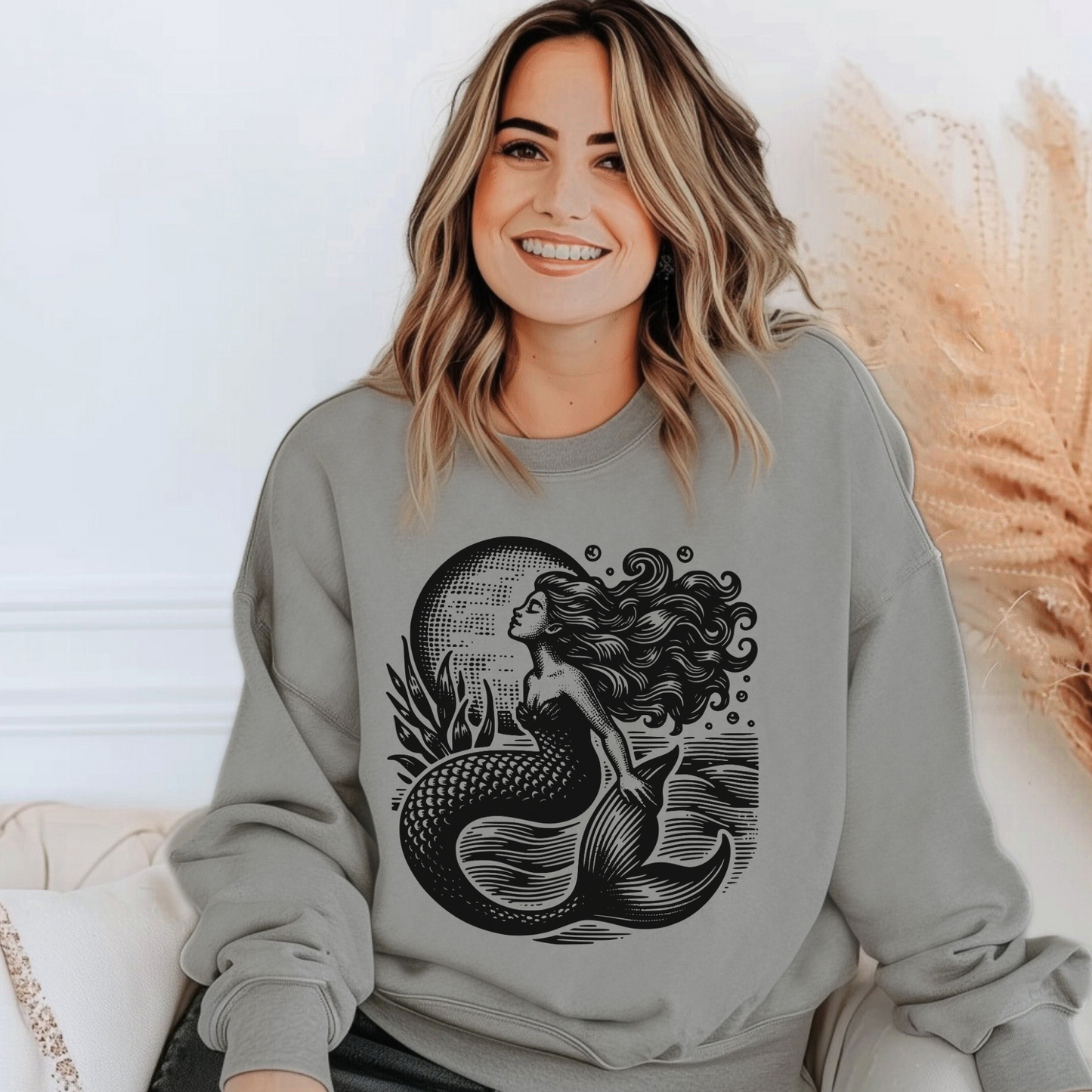 Comfort Colors 1566 sweatshirt in Grey featuring a vintage black mermaid design with ocean waves and sea details. This nautical-inspired pullover has a relaxed fit, ribbed cuffs, and a soft cotton blend that makes it perfect for layering or lounging. A stylish and cozy choice for women and teens who love coastal fashion, mermaid art, or fantasy-inspired apparel. Available in sizes S–3XL, it makes a great gift for holidays, birthdays, or casual everyday wear.