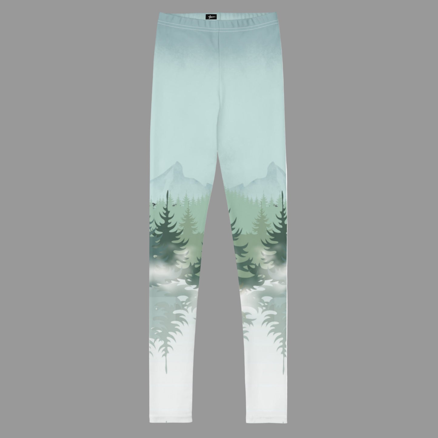 Winter Forest Kids Leggings in sizes 8–20 with nature-inspired snowy mountain and pine tree graphics. Part of a family matching activewear collection, perfect for winter holiday outfits, ski lodge vacations, cozy après-ski days, outdoor adventures, and family photos. Soft microfiber yarn with four-way stretch and durable overlock stitching. Made-to-order eco-friendly leggings for stylish, coordinated family winter looks.