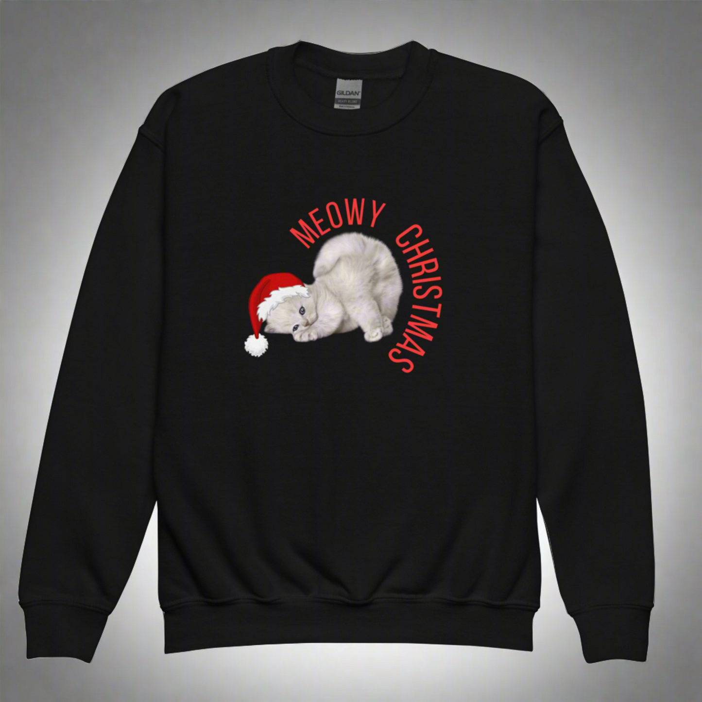 Youth Meowy Christmas Sweatshirt in sizes XS–XL features a festive holiday cat design with playful Christmas flair, perfect for cat-loving kids and tweens. This cozy unisex pullover makes a great gift for boys and girls who adore cats, Christmas sweaters, or funny holiday apparel. Ideal for holiday parties, classroom celebrations, or casual winter wear, this Christmas cat sweatshirt blends comfort and humor for a meowgical holiday season.