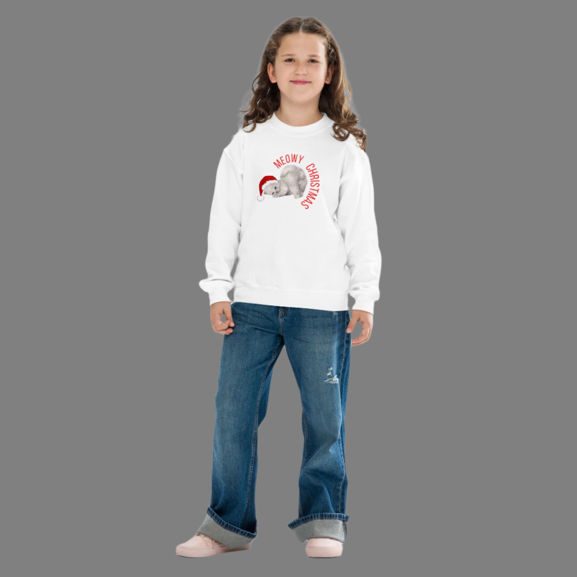 Get into the holiday spirit with our Youth Meowy Christmas Sweatshirt, offered in sizes XS through XL. This festive pullover features a charming Christmas kitty that kids and tweens will adore. It’s perfect for holiday parades, tree lightings, and cozy winter lounging. Ideal for cat lovers and Christmas fans, this youth sweatshirt makes a funny, heartwarming gift and a fun addition to holiday wardrobe collections.