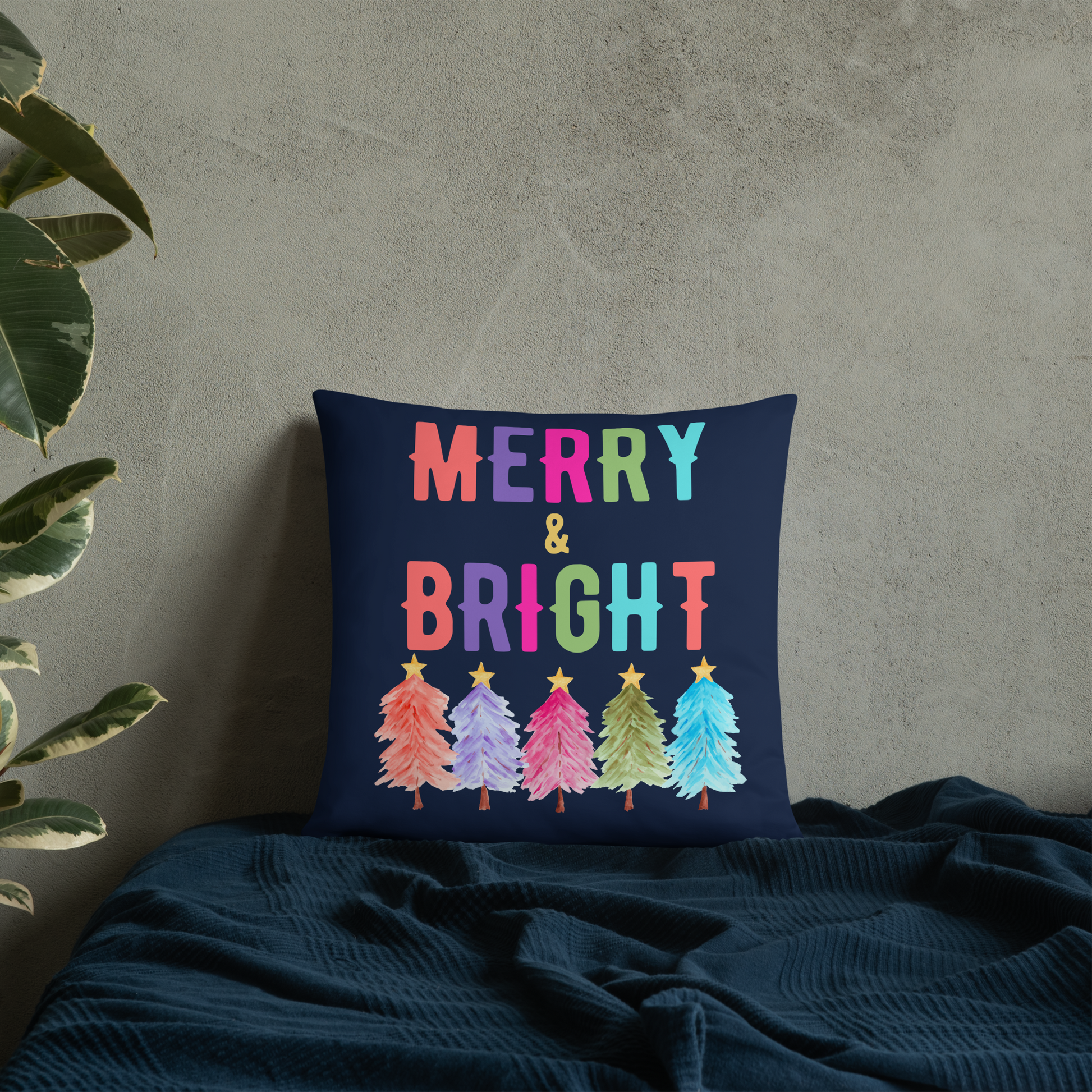Merry & Bright Christmas Throw Pillow, Holiday Home and Patio Decor. This square pillow has a deep blue navy background, with Merry & Bright printed in Coral, Purple, Pink, Green, Teal. This pillow also features Christmas trees in the same colors. by jaecrece