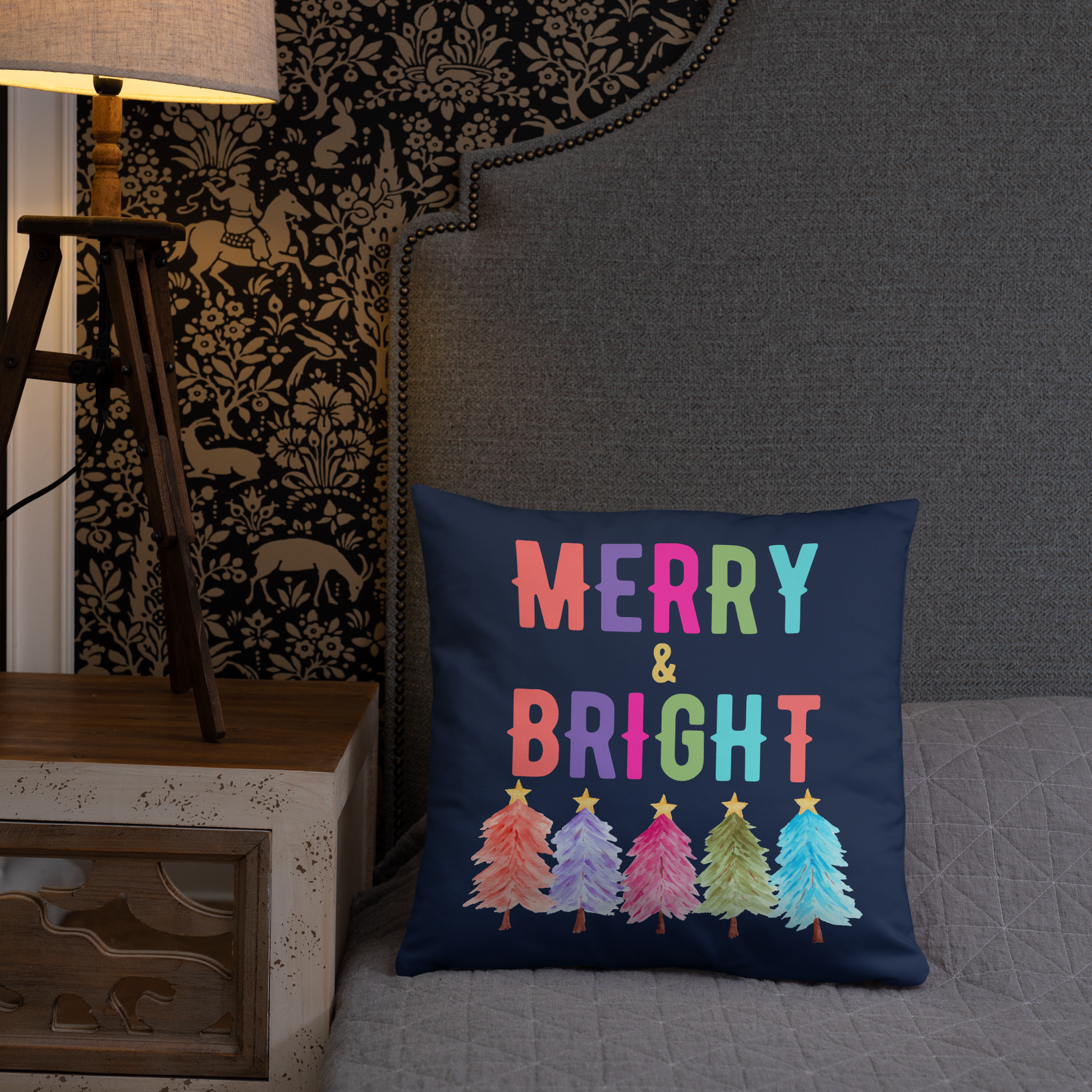 Merry & Bright Christmas Throw Pillow, Holiday Home and Patio Decor. This square pillow has a deep blue navy background, with Merry & Bright printed in Coral, Purple, Pink, Green, Teal. This pillow also features Christmas trees in the same colors. by jaecrece