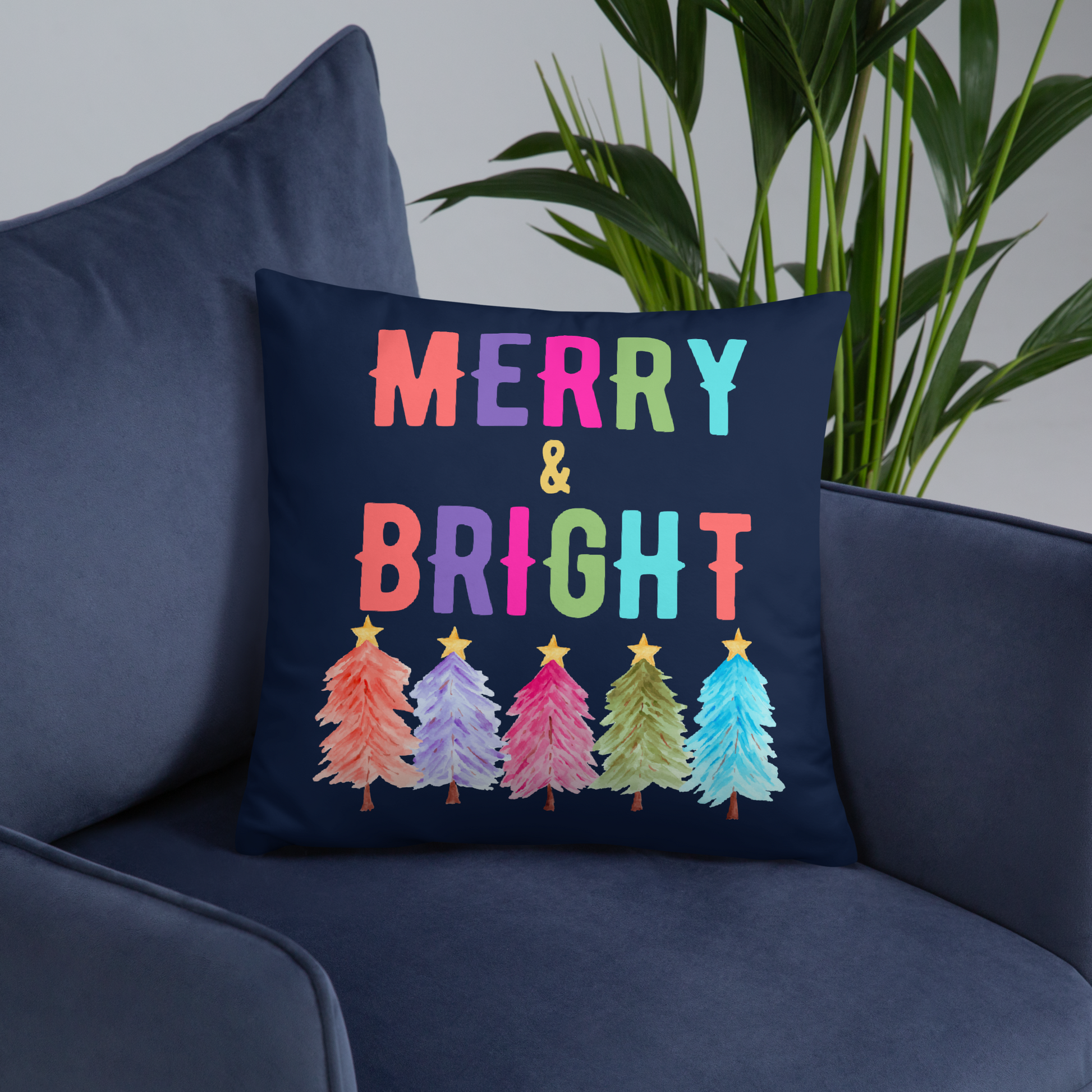 Merry & Bright Christmas Throw Pillow, Holiday Home and Patio Decor. This square pillow has a deep blue navy background, with Merry & Bright printed in Coral, Purple, Pink, Green, Teal. This pillow also features Christmas trees in the same colors. by jaecrece