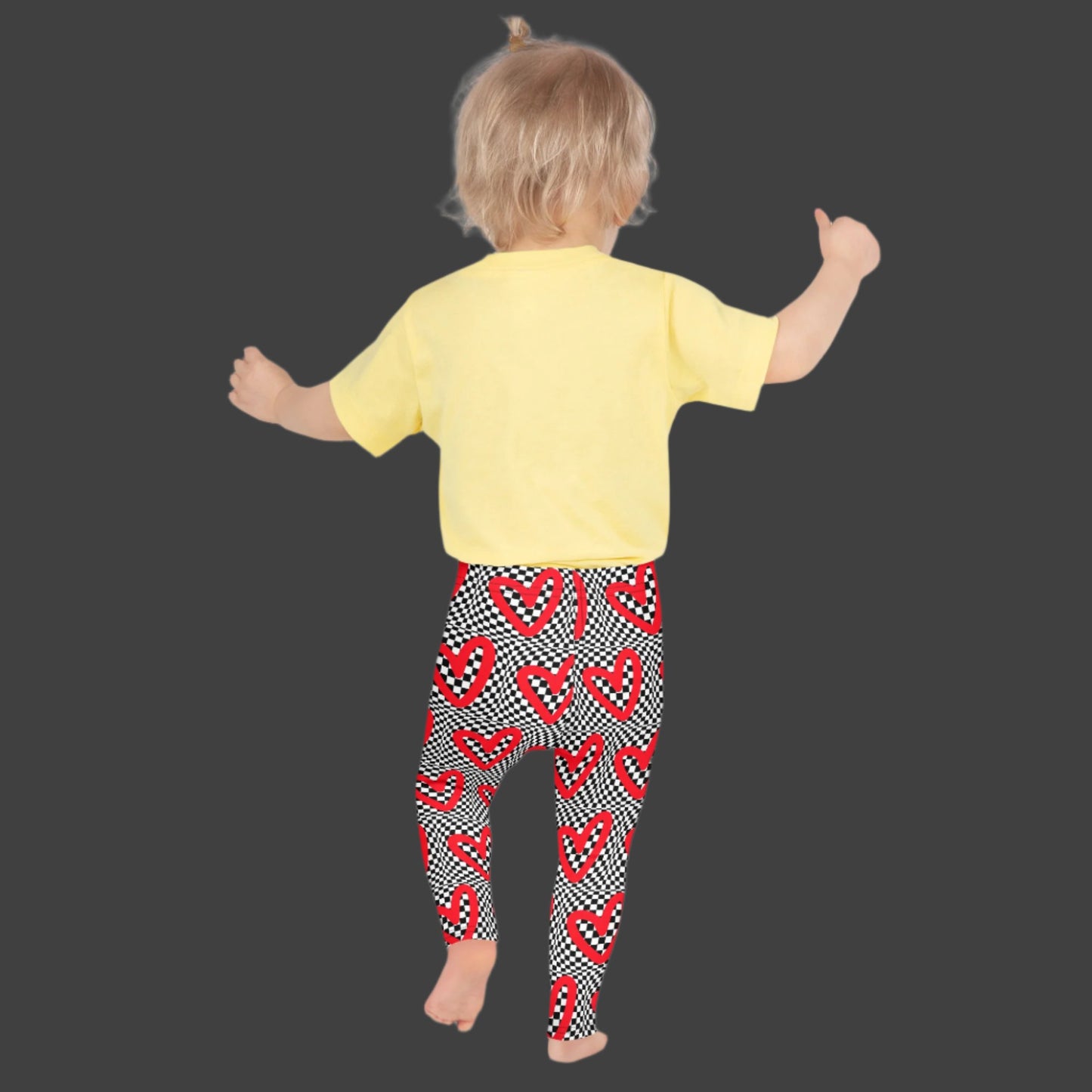 Checkerboard Heart Toddler Leggings, Size 2T- 7. Black and White checker pattern with bold red hearts. Optical illusion child pants, perfect for a gift or back to school, by jaecrece