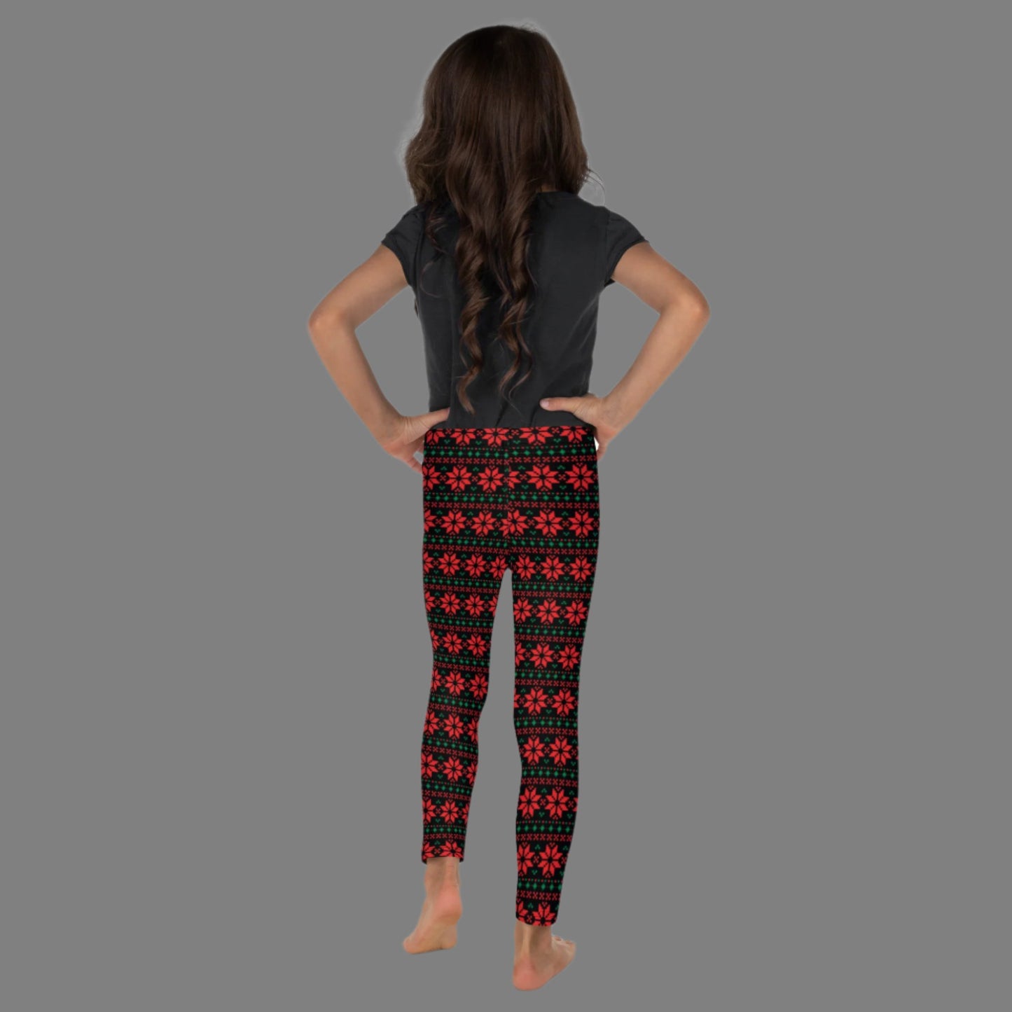 Christmas Poinsettia Toddler Leggings. Size 2T-7. Black leggings with an ugly sweater red and green poinsettia holiday pattern, by jaecrece