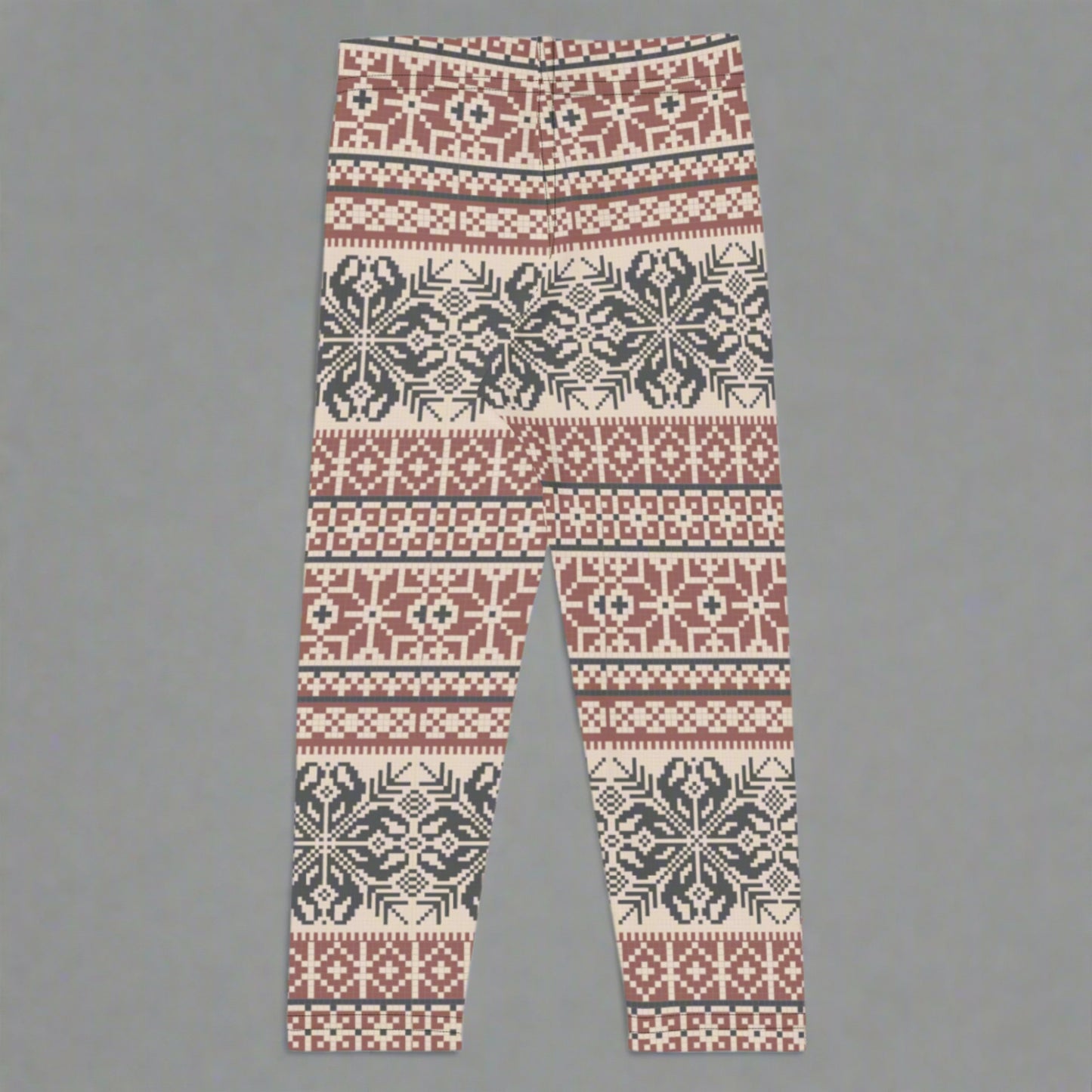 Image: Fair Isle Girls Leggings with a Nordic Snowflake pattern in cream, maroon and navy blue. Scandi Active wear yoga pants in child an toddler sizes 2T-7, by jaecrece