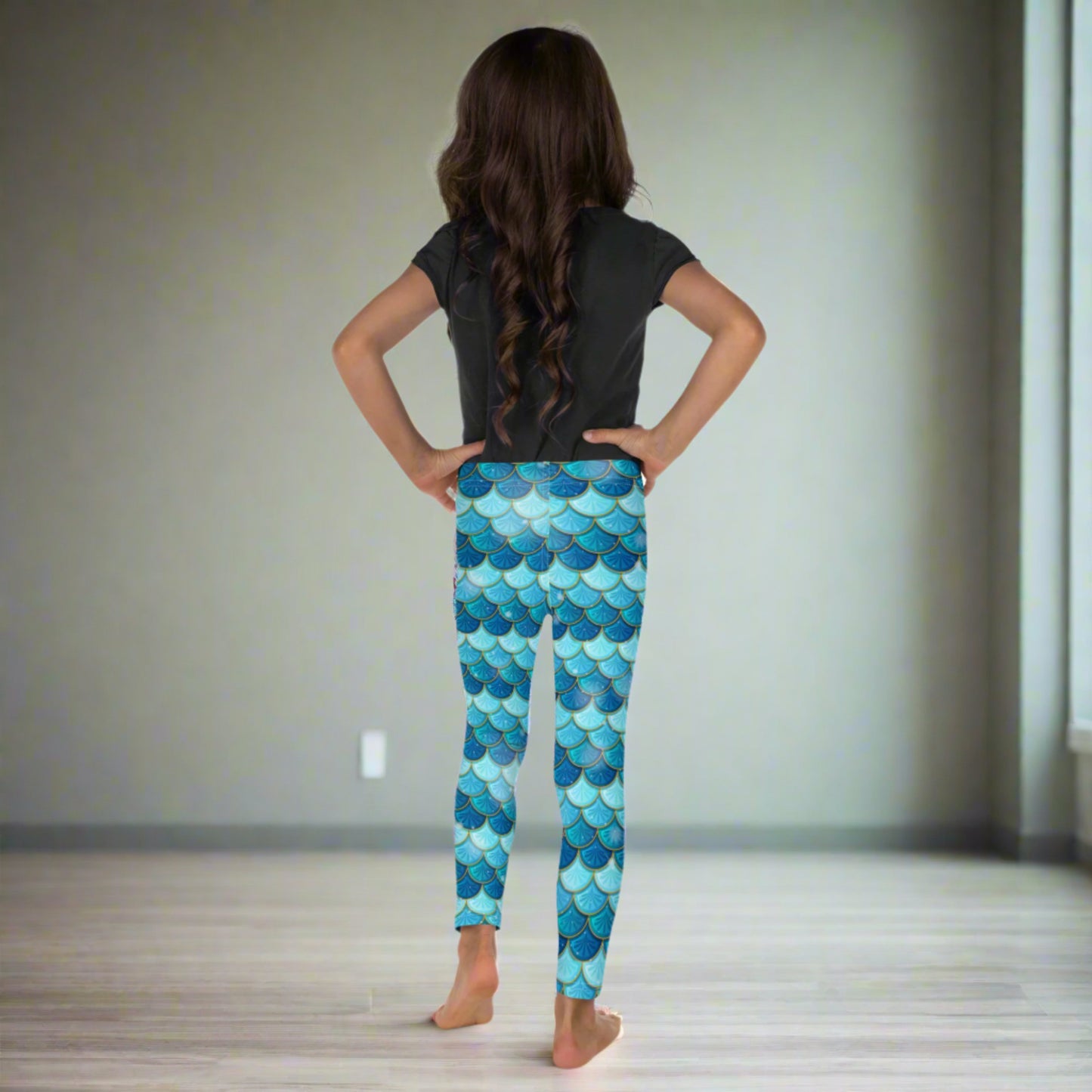 Image: Blue Mermaid Girls Leggings. These toddler yoga pants are mermaidcore aesthetic and available in sizes 2T-7. Perfect for mermaid themed birthday parties or Halloween costumes, by jaecrece