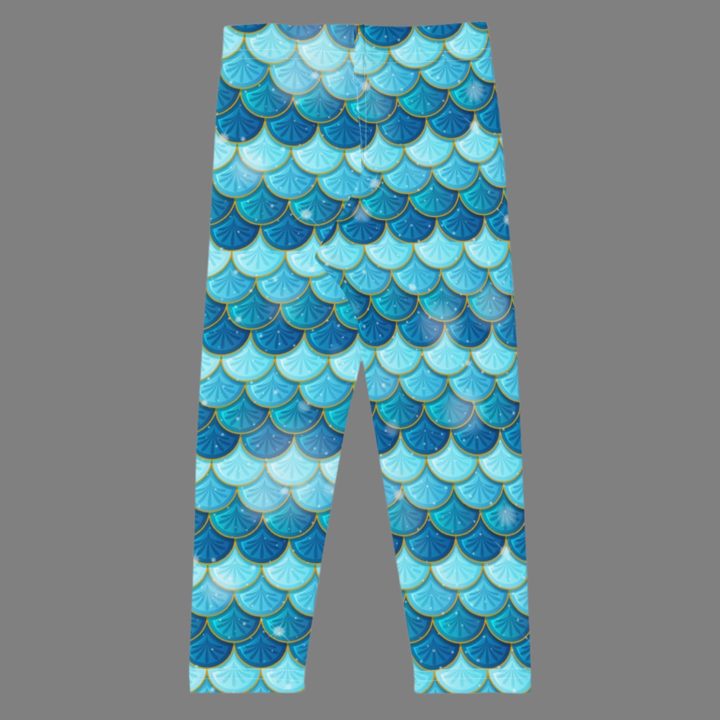 Image: Blue Mermaid Girls Leggings. These toddler yoga pants are mermaidcore aesthetic and available in sizes 2T-7. Perfect for mermaid themed birthday parties or Halloween costumes, by jaecrece