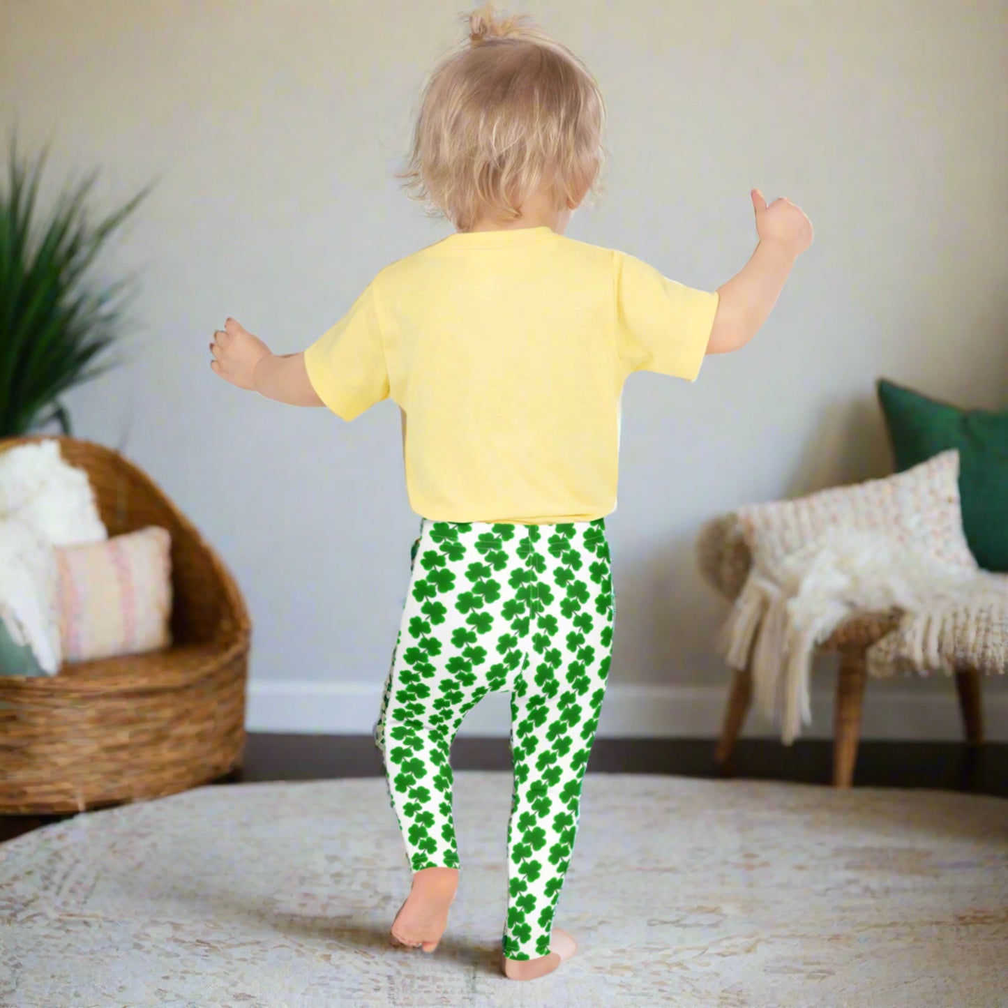 Image: St Patricks Day Leggings for toddlers and girls. Great white tights with a pattern of four leaf covers repeating down each leg. Also available in tween girl and womens sizes for family matching outfits, by jaecrece