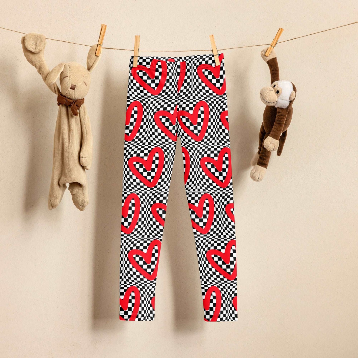 Checkerboard Heart Toddler Leggings, Size 2T- 7. Black and White checker pattern with bold red hearts. Optical illusion child pants, perfect for a gift or back to school, by jaecrece