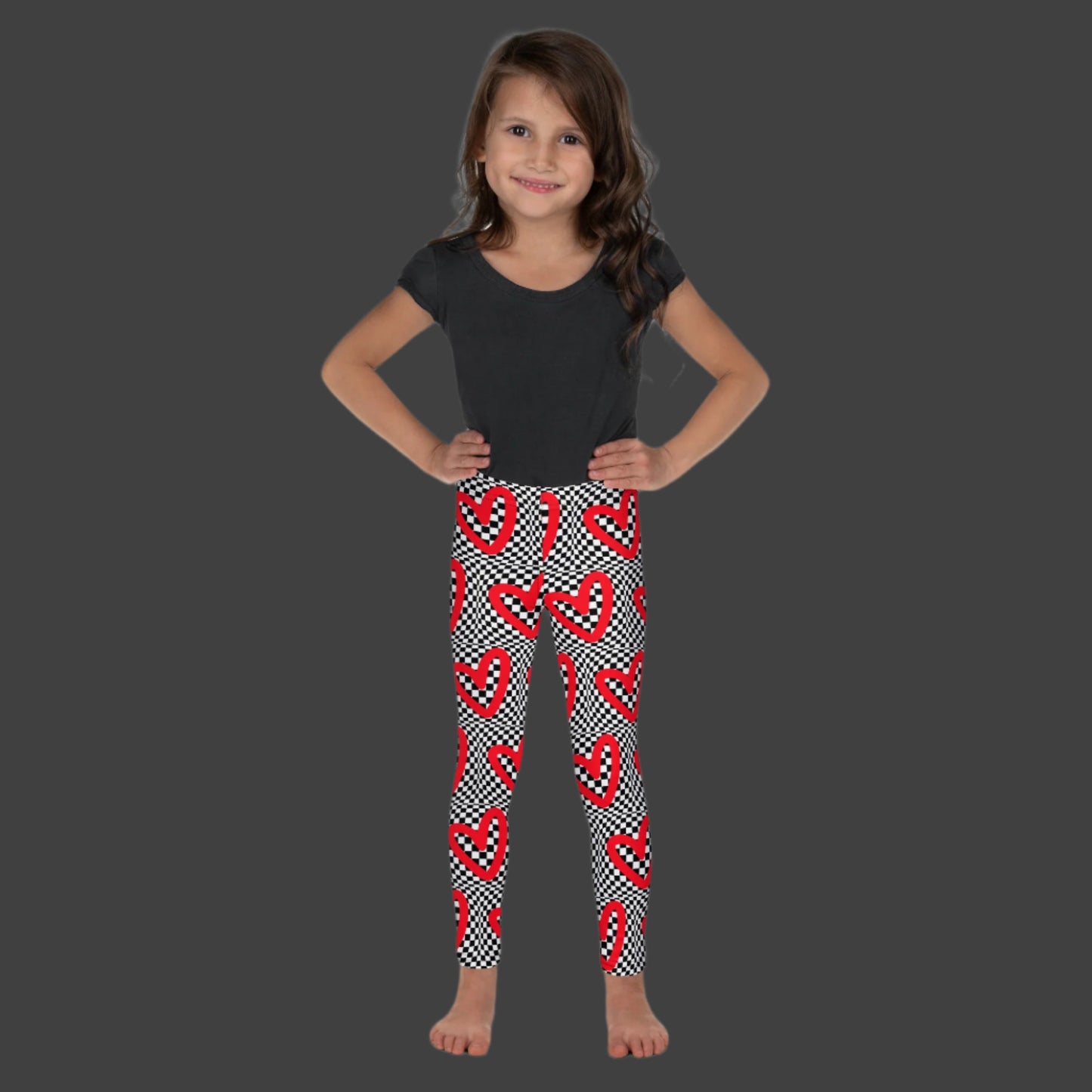 Checkerboard Heart Toddler Leggings, Size 2T- 7. Black and White checker pattern with bold red hearts. Optical illusion child pants, perfect for a gift or back to school, by jaecrece