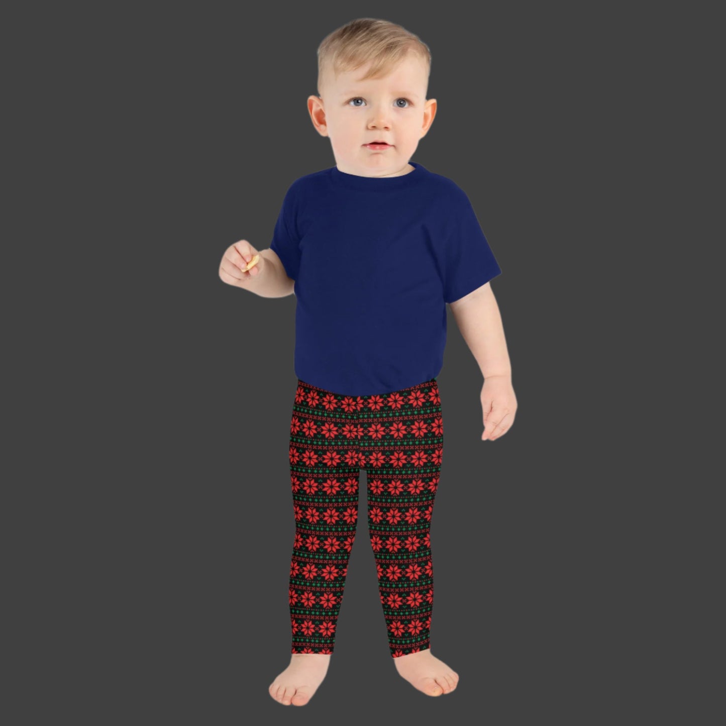 Christmas Poinsettia Toddler Leggings. Size 2T-7. Black leggings with an ugly sweater red and green poinsettia holiday pattern, by jaecrece
