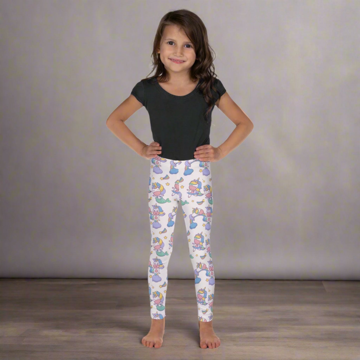 Image: Unicorn Mermaid Kawaii Girls Leggings. These pastel pink yoga pants feature a cute pattern graphic of Unicorn mermaids, stars and rainbows. The perfect birthday present, Christmas gift, school outfit for toddlers, tweens and teens, by jaecrece