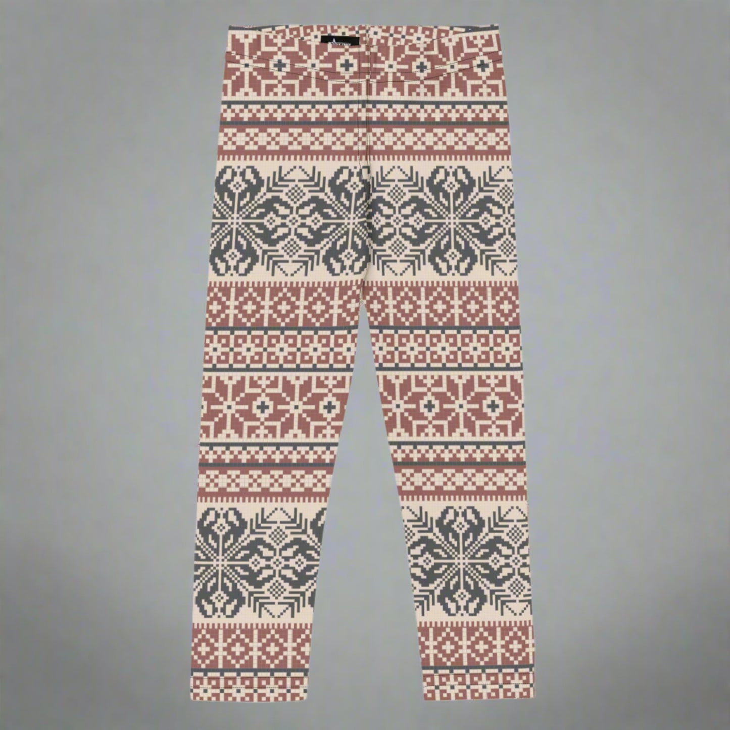 Image: Fair Isle Girls Leggings with a Nordic Snowflake pattern in cream, maroon and navy blue. Scandi Active wear yoga pants in child an toddler sizes 2T-7, by jaecrece