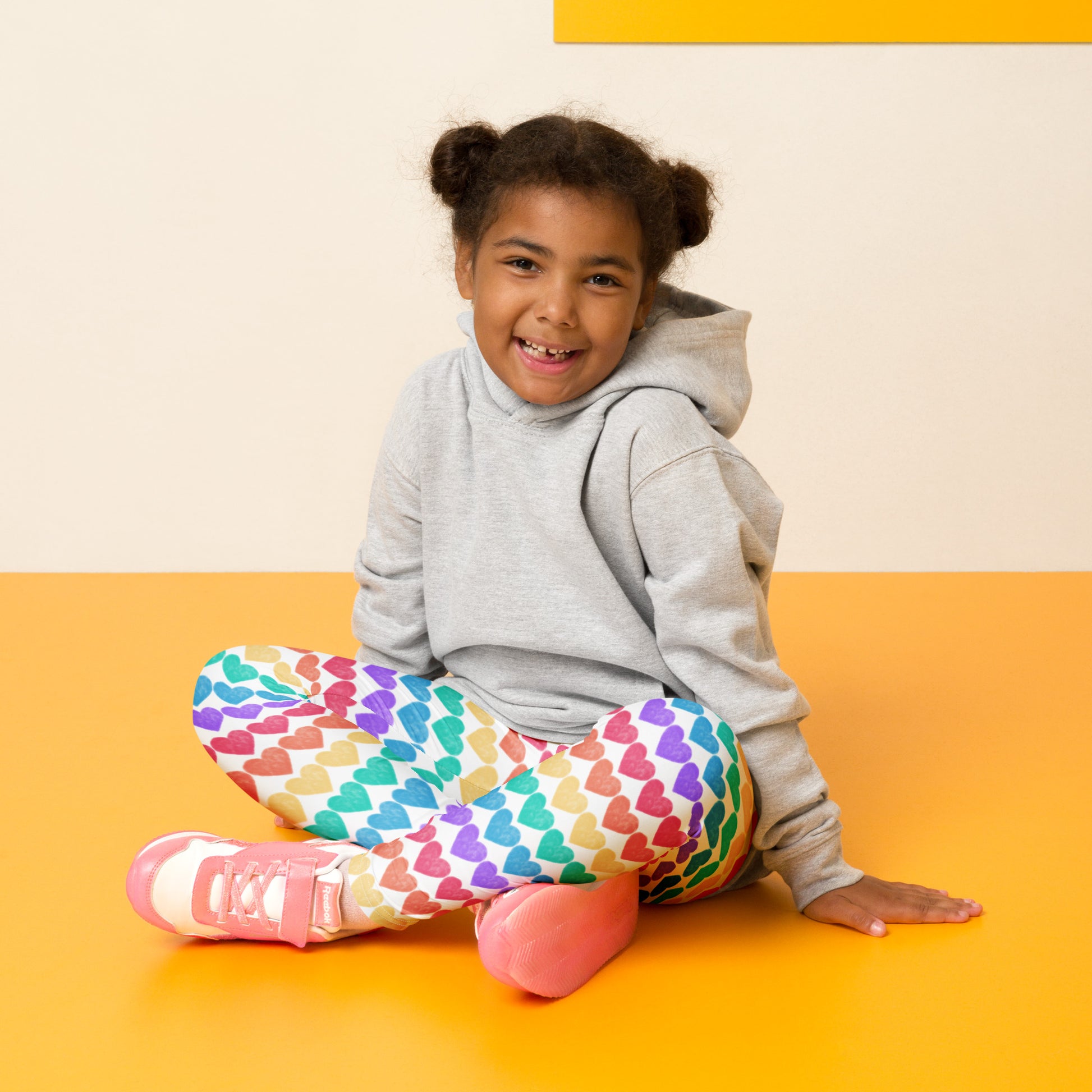 These full-length Rainbow Hearts Toddler Leggings in sizes 2T–7 feature rows of multicolored hearts for a cheerful, fun look. Made with soft, stretchy microfiber, they’re designed to keep up with all-day play. A comfy elastic waistband and four-way stretch make these leggings perfect for Pride events, school days, or playdates. Available in matching youth and women’s sizes for colorful family outfits.