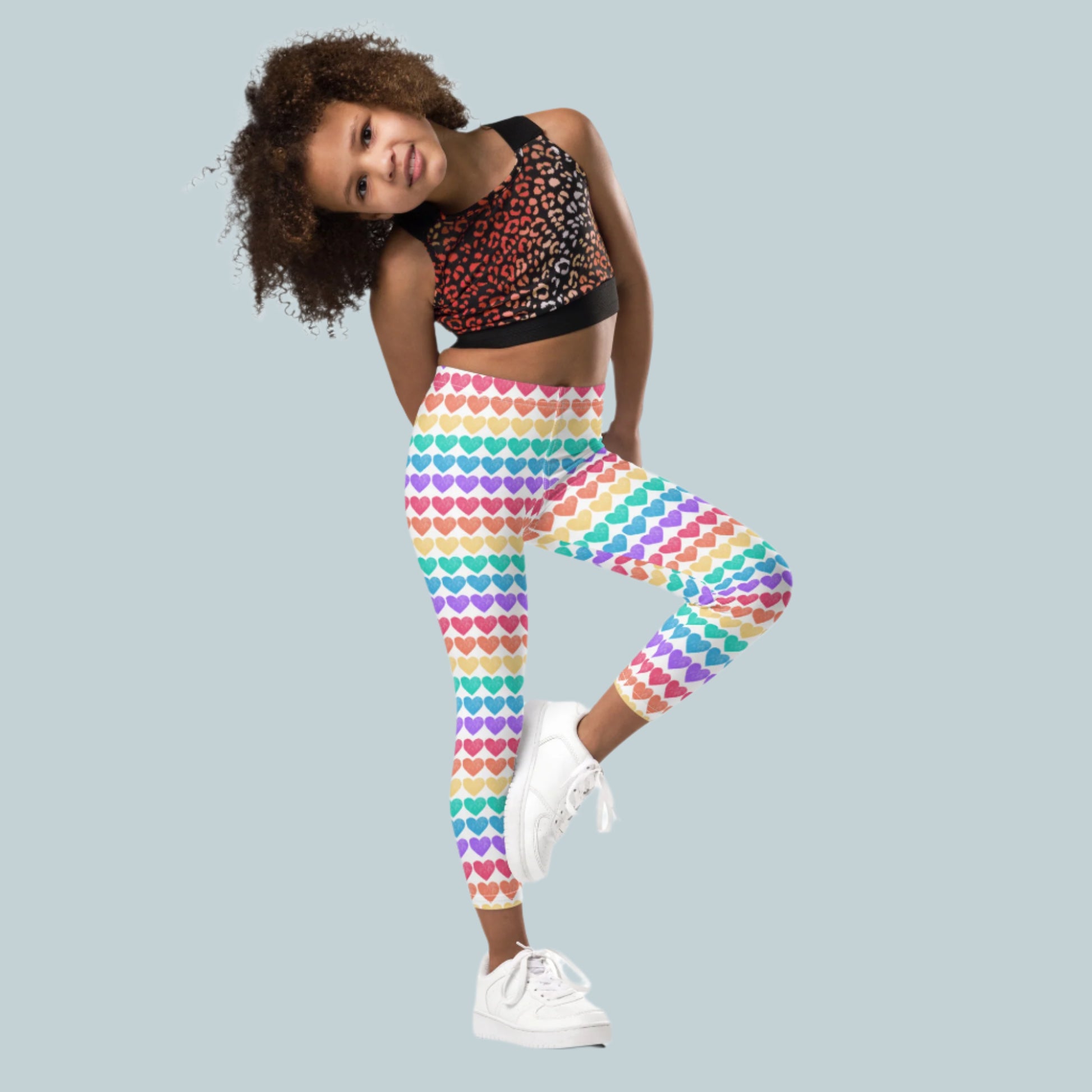 Colorful and cute, these toddler leggings with rainbow hearts are great for playdates, Pride events, or twinning with mom. The polyester-spandex blend ensures all-day flexibility and comfort, while the full-length fit and cheerful design make them a vibrant wardrobe favorite. Sizes 2T–7 available.
