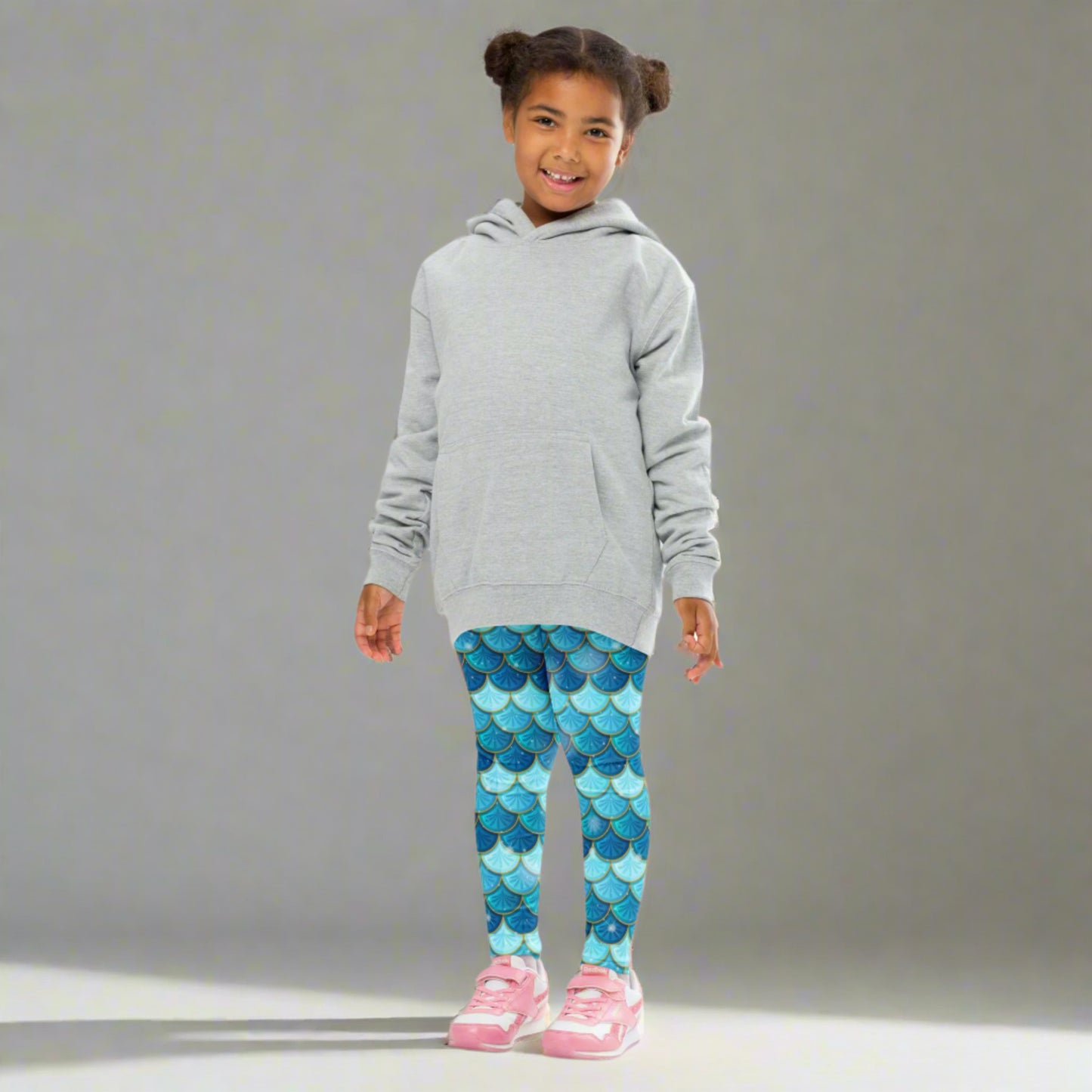 Image: Blue Mermaid Girls Leggings. These toddler yoga pants are mermaidcore aesthetic and available in sizes 2T-7. Perfect for mermaid themed birthday parties or Halloween costumes, by jaecrece