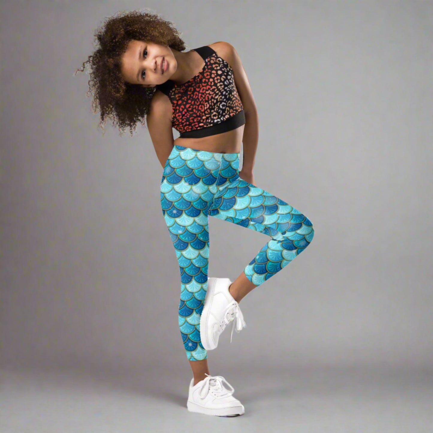 Image: Blue Mermaid Girls Leggings. These toddler yoga pants are mermaidcore aesthetic and available in sizes 2T-7. Perfect for mermaid themed birthday parties or Halloween costumes, by jaecrece