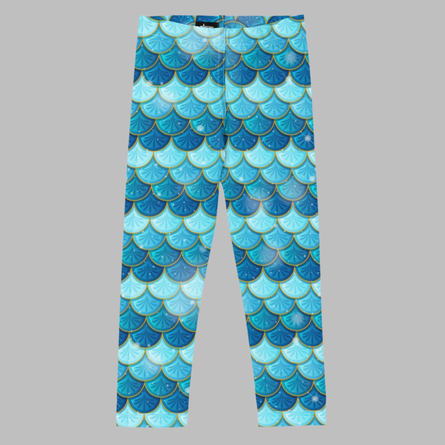 Image: Blue Mermaid Girls Leggings. These toddler yoga pants are mermaidcore aesthetic and available in sizes 2T-7. Perfect for mermaid themed birthday parties or Halloween costumes, by jaecrece