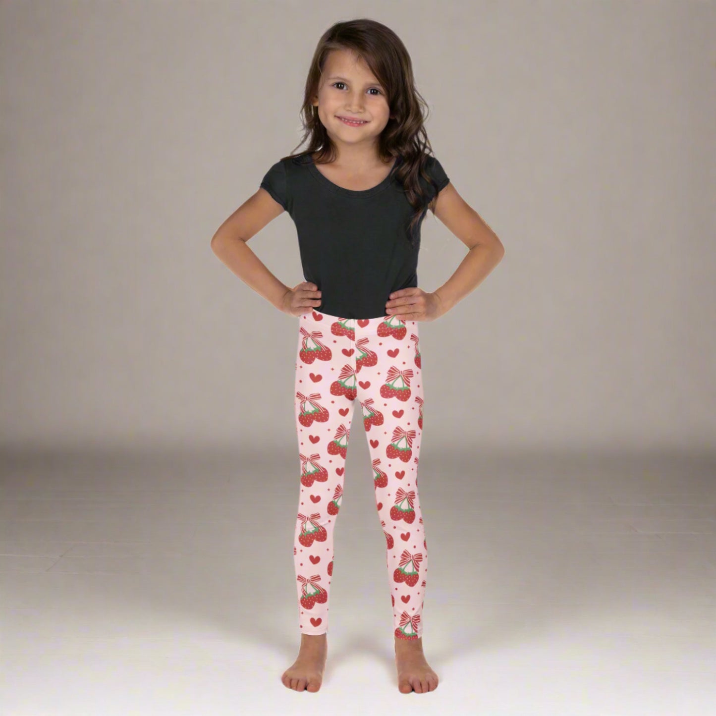 Image: Your little one will love these sweet pink leggings, covered in strawberries and candy red bows. Designed for toddlers and girls in sizes 2T to 7, they’re soft, stretchy, and perfect for everyday wear or special occasions. Great for adding a touch of girly charm to any outfit, these leggings are sure to become a favorite in her wardrobe and make a fun party gift, by jaecrece.