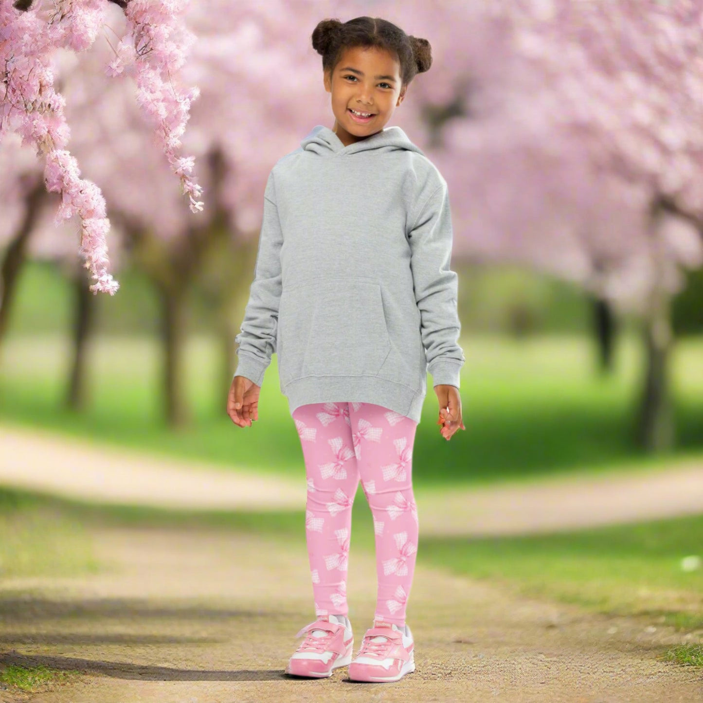 Image: These adorable pink bow leggings for toddlers and girls in sizes 2T to 7 feature a sweet gingham ribbon print perfect for dress up or play. The coquette inspired design adds a girly touch to any outfit, while the soft, stretchy fabric keeps your little one comfy all day. A delightful gift for birthdays, holidays, or spring photo shoots, by jaecrece.