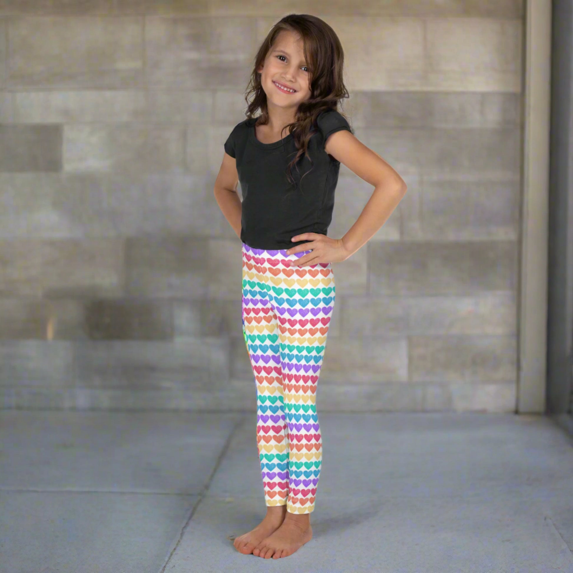 These toddler leggings feature a rainbow heart pattern perfect for Pride events, parades, and everyday adventures. The vibrant design and soft four-way stretch fabric ensure a comfy fit from morning to bedtime. These leggings are a great option for matching sibling or mommy-and-me outfits, making them ideal for family photos and festive occasions.