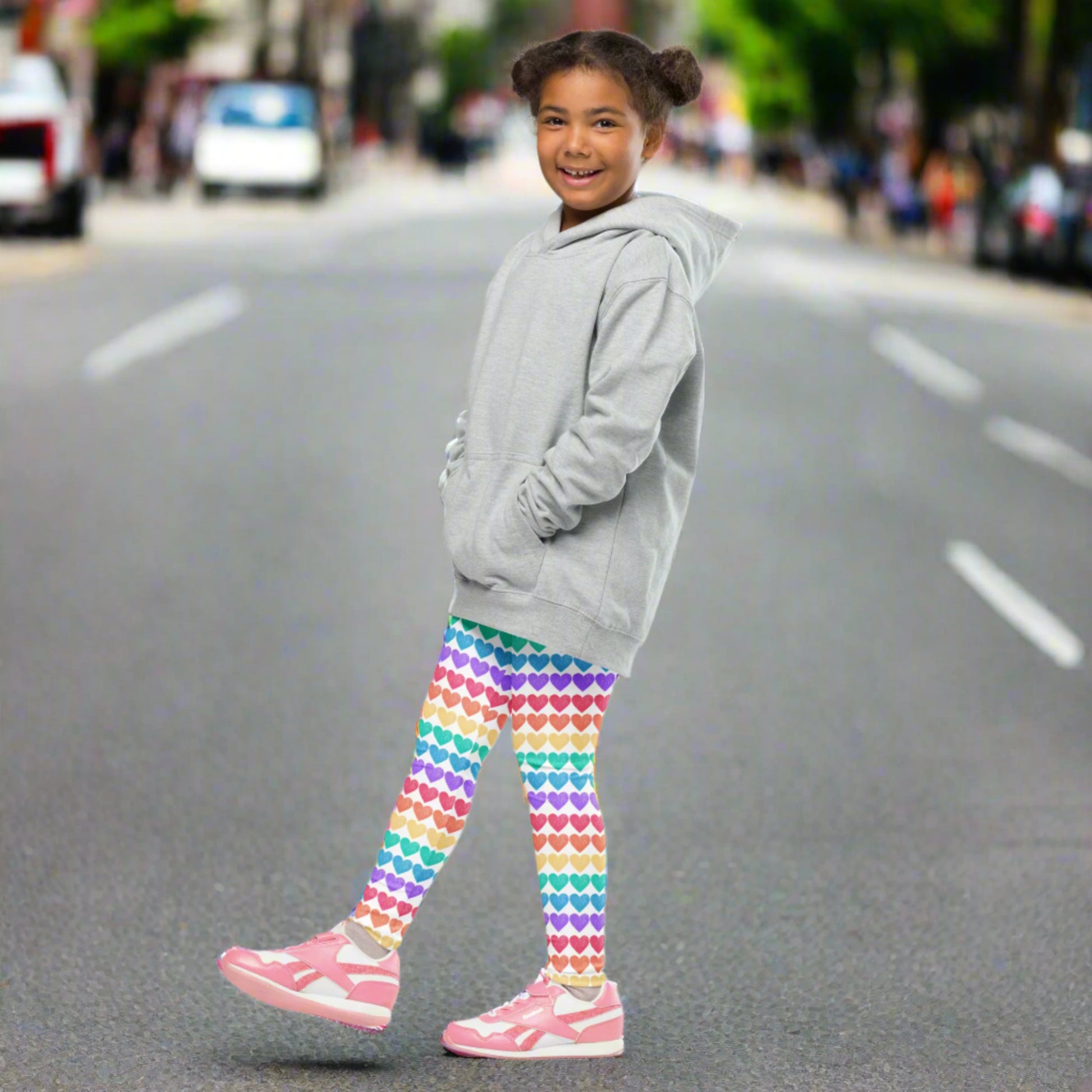 These toddler rainbow leggings are full-length and made from a comfy polyester/spandex blend. With an all-over rainbow heart design, they’re ideal for colorful school days, family outings, or playful photo ops. Available in sizes 2T–7, they feature four-way stretch and an elastic waistband to ensure a perfect fit for every adventure-loving kid.