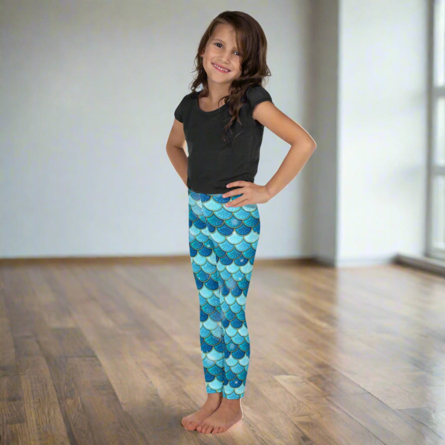 Image: Blue Mermaid Girls Leggings. These toddler yoga pants are mermaidcore aesthetic and available in sizes 2T-7. Perfect for mermaid themed birthday parties or Halloween costumes, by jaecrece