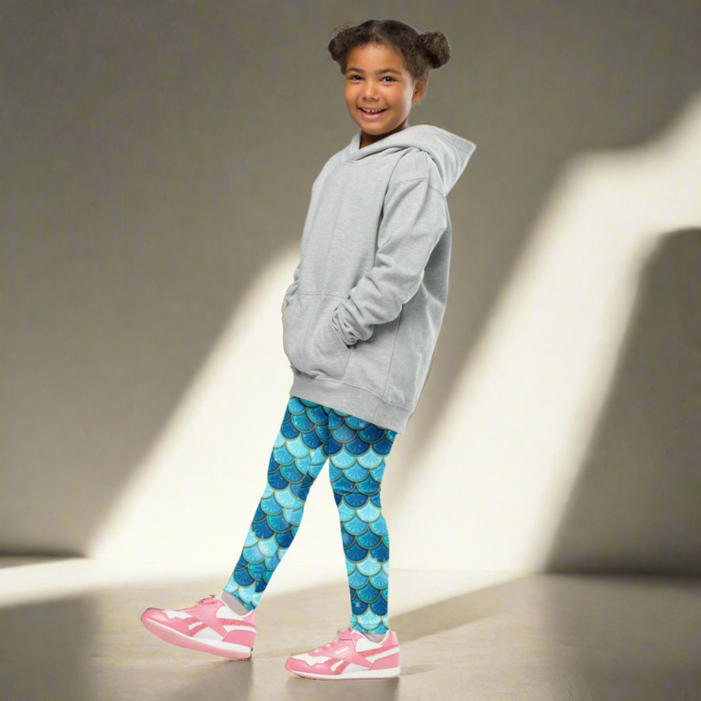 Image: Blue Mermaid Girls Leggings. These toddler yoga pants are mermaidcore aesthetic and available in sizes 2T-7. Perfect for mermaid themed birthday parties or Halloween costumes, by jaecrece
