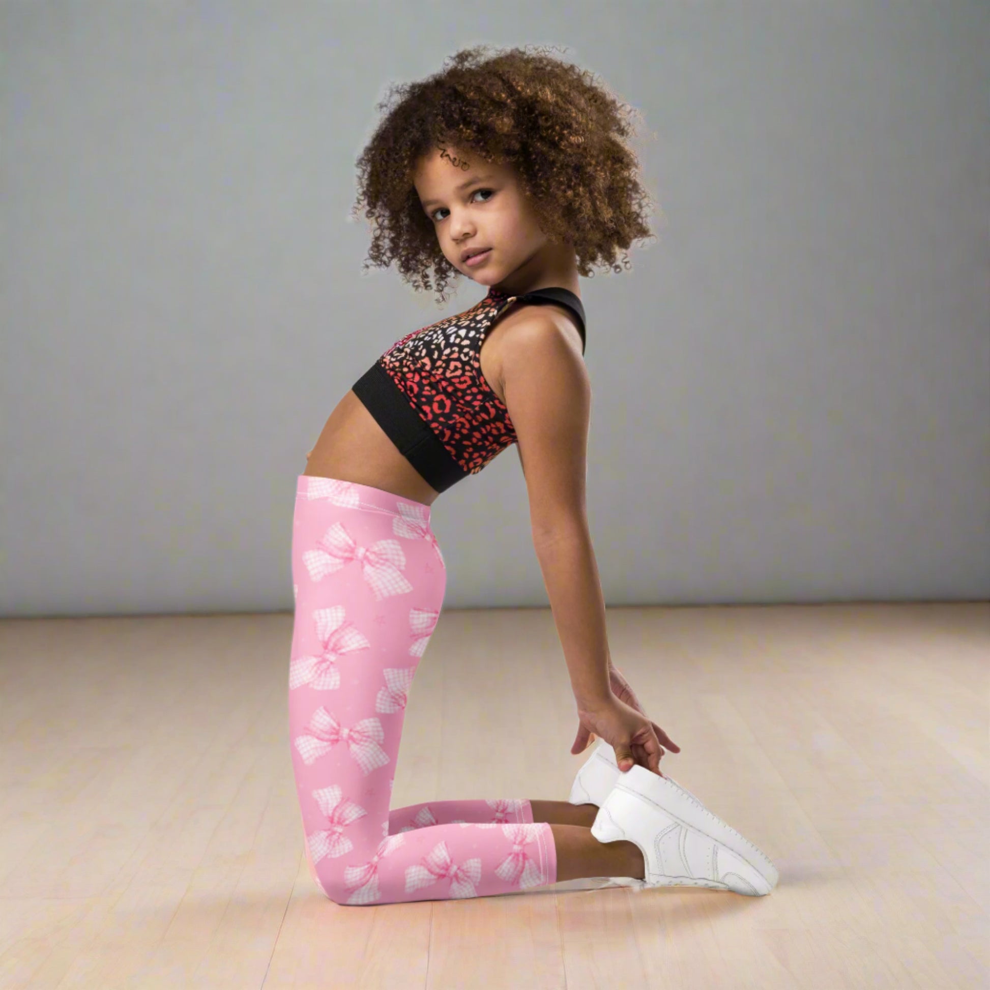 Image: Made for toddlers and girls who love to twirl, these pink bow leggings in sizes 2T to 7 have an all-over gingham ribbon design that’s perfect for dance class or storytime. The soft, stretchy material ensures comfort, while the cute print adds flair to everyday outfits or special occasions, by jaecrece.