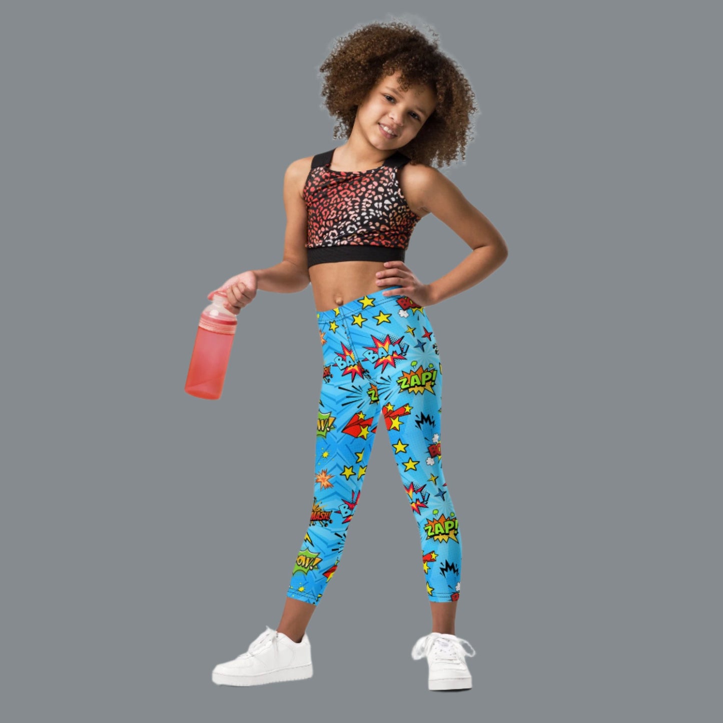 Blue leggings in size 2T-7, with superhero graphics, and phrases like: Bam, Smash, Zap, Kapow. Comic Book Toddler Leggings, Superhero Kids Pants, Comic Con Cosplay Tights, Birthday Party Gift for Boys or Girls, by jaecrece
