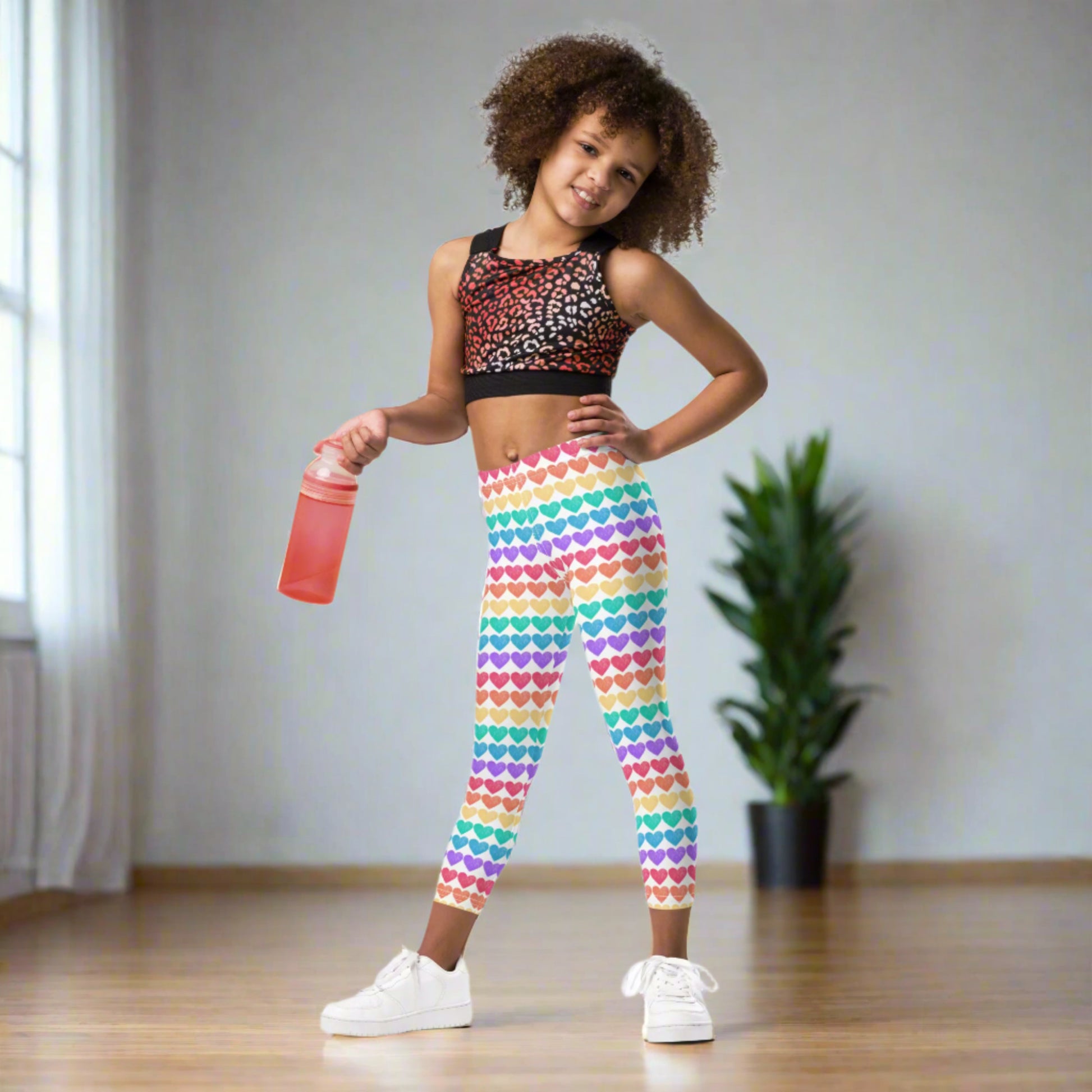 Featuring rainbow heart stripes, these toddler leggings in sizes 2T–7 bring vibrant joy to every step. Designed with four-way stretch, a comfy elastic waistband, and a snug full-length fit, these leggings are ideal for holidays, themed parties, and everyday rainbow-loving fun.