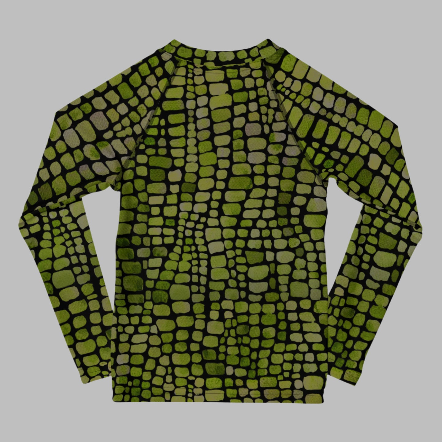 Reptile print toddler rash guard with UPF protection, featuring green scales for a fun and fierce look. This swim top is perfect for costumes, beach adventures, or outdoor play in sizes 2T–7. Designed for kids who love dinosaurs, lizards, or snakes, it’s a playful and practical piece for sun-safe summer days. Ideal for both boys and girls.