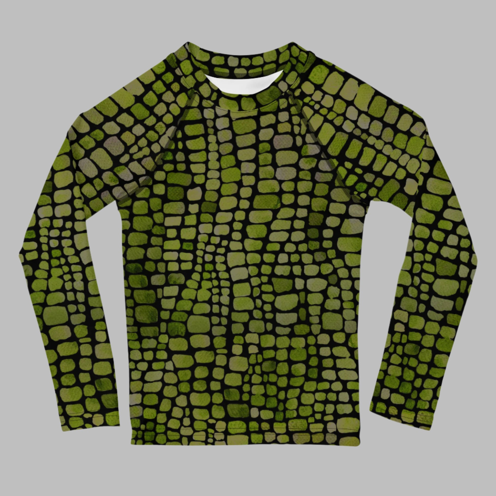 Kids rash guard with green reptile scales, perfect for toddlers in sizes 2T–7. This long sleeve swim shirt is great for water play, beach fun, and animal costume adventures. Use it for dinosaur or lizard dress-up or as part of a unique swim outfit. Lightweight and protective, it’s a favorite for parents who want UV safety and kids who love reptiles.