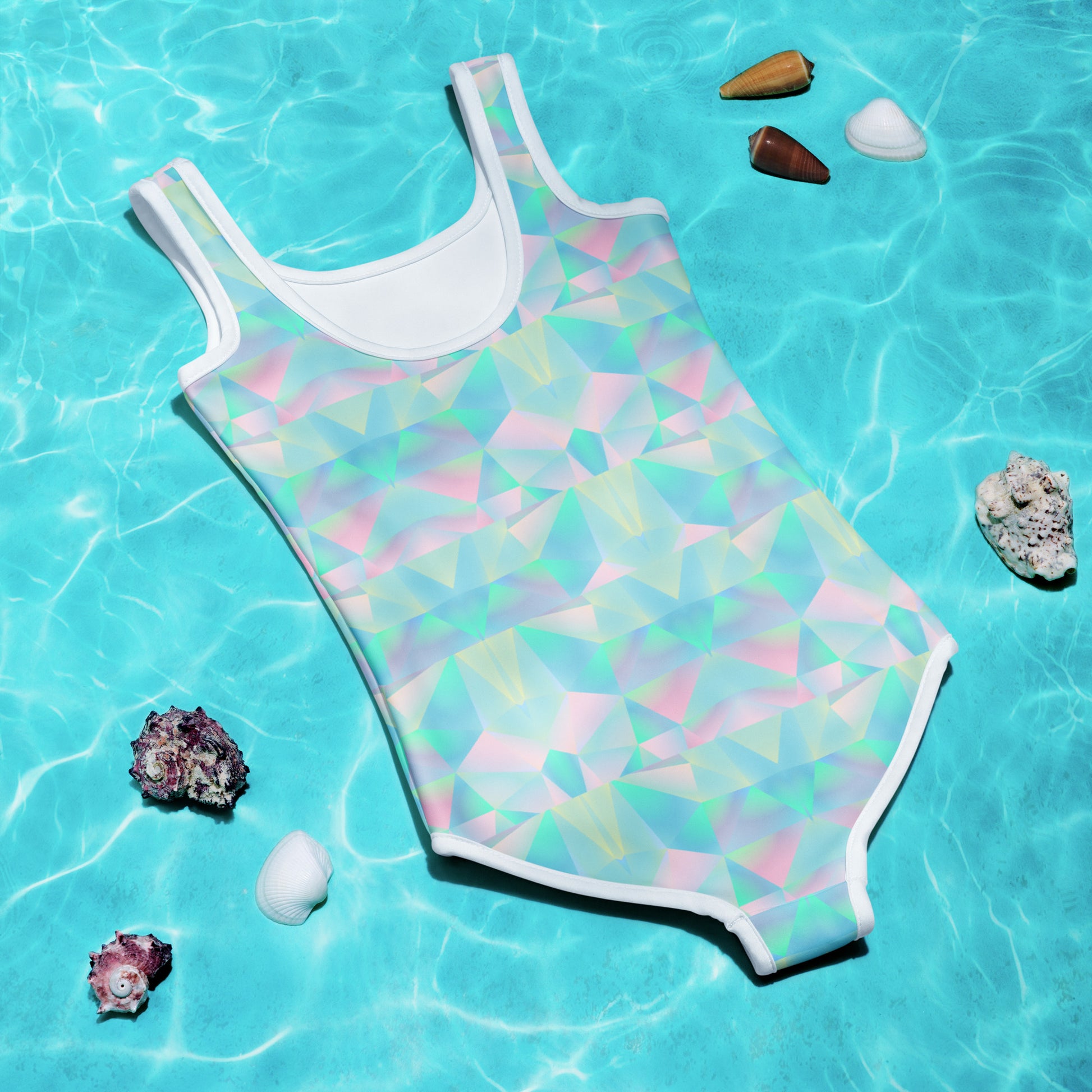 Toddler girls one-piece pastel swimsuit, available in sizes 2T–7, featuring vibrant pastel rainbow tones, UPF 38–40 fabric, and a soft double-layered front for comfort and coverage. Built for beach days, pool parties, and active play, this swimsuit is part of a family matching swimwear collection with coordinating girls, women’s, men’s, and matching beach towel options for a complete vacation look.