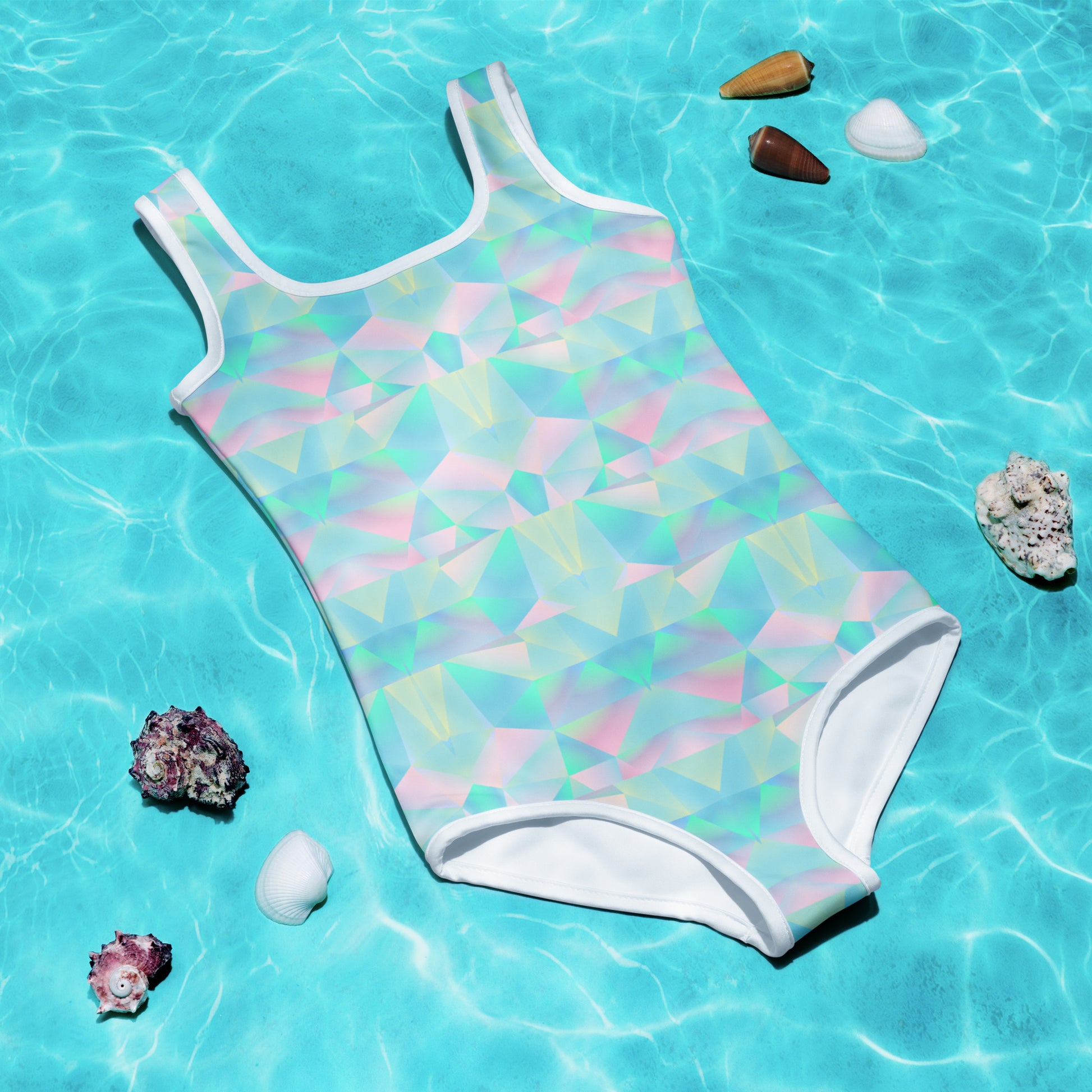 Pastel Prisms toddler girls bathing suit in sizes 2T–7, designed with a colorful rainbow palette that shines in the sun. Featuring four-way stretch, a secure fit, and UPF 38–40 sun protection, this swimsuit blends comfort and durability for active little swimmers. Matching family swimwear options include sizes for older girls, women, and men, plus a coordinating beach towel for vacations, pool parties, or summer photoshoots.
