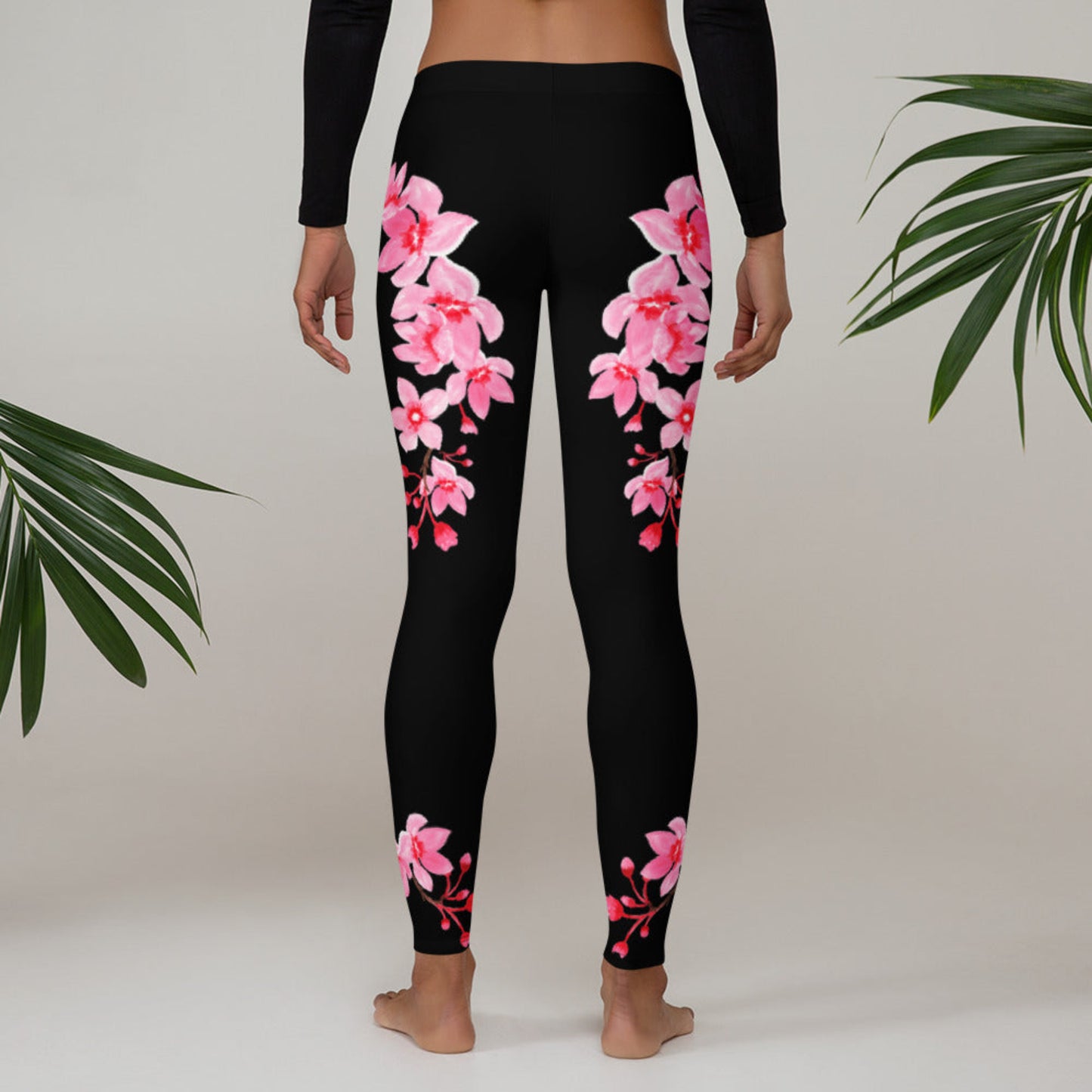 Image: Japanese Cherry Blossom Leggings. These black yoga pants have bright pink swirling down the legs. The perfect sakura gift for the Japanese cherry blossom lover in your life, by jaecrece